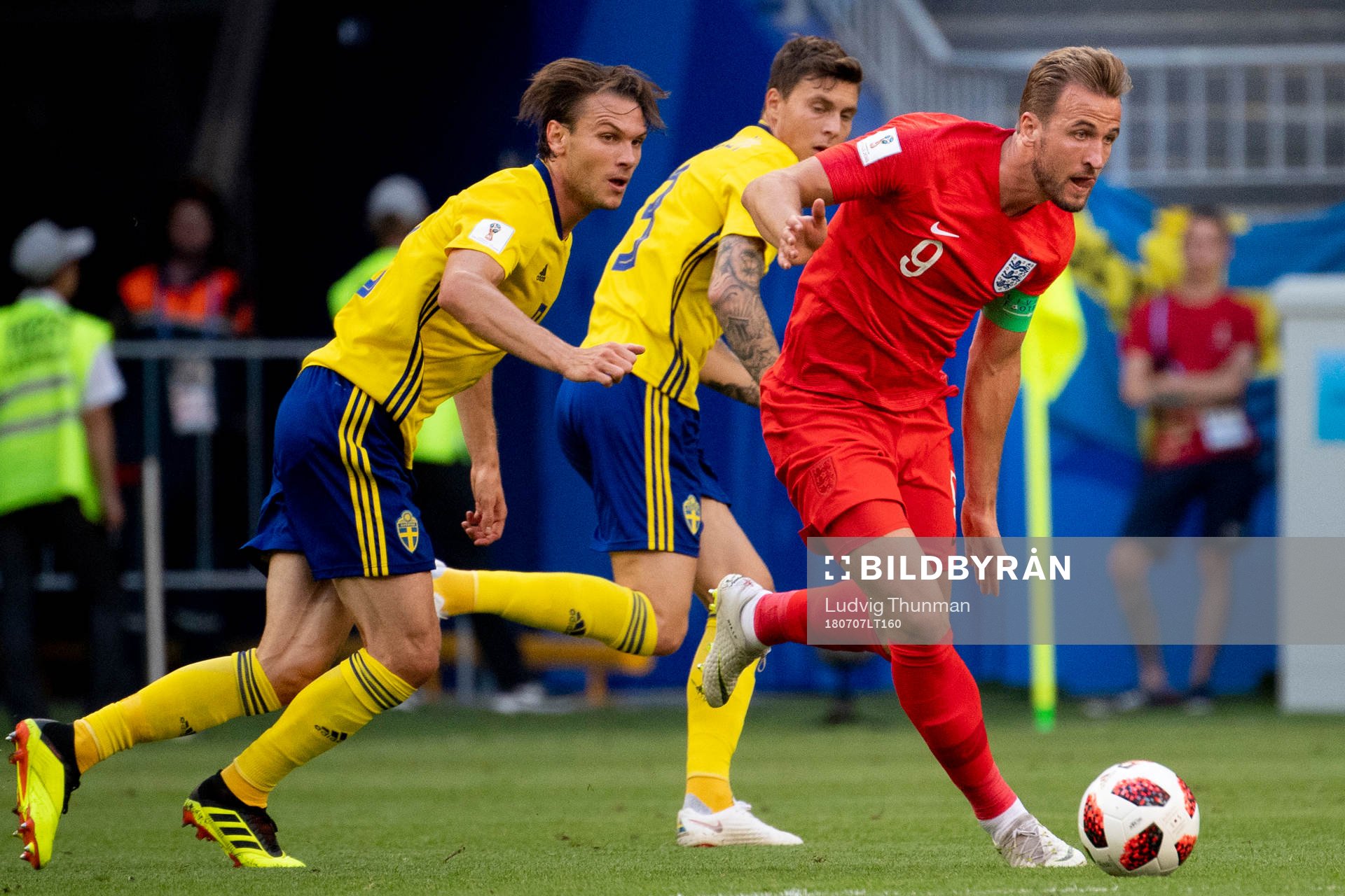 Harry Kane of England and Albin Ekdal of Sweden