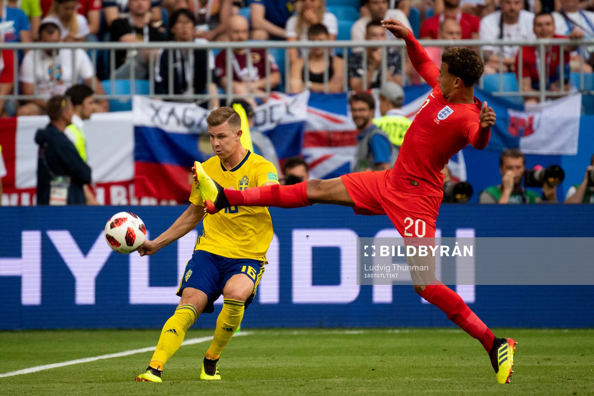 Emil Krafth of Sweden and Dele Alli of England