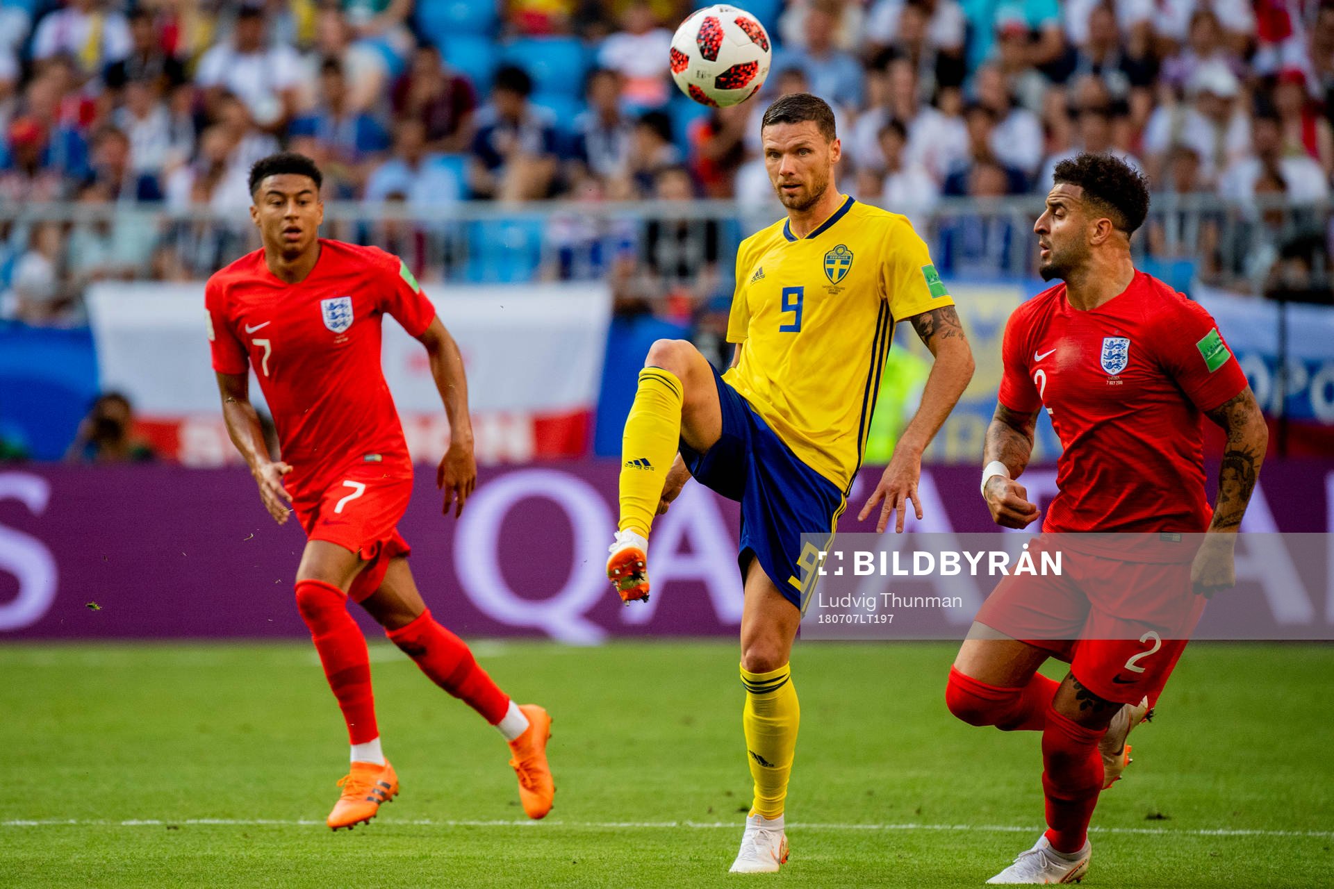 Kyle Walker of England, Marcus Berg of Sweden and Kyle