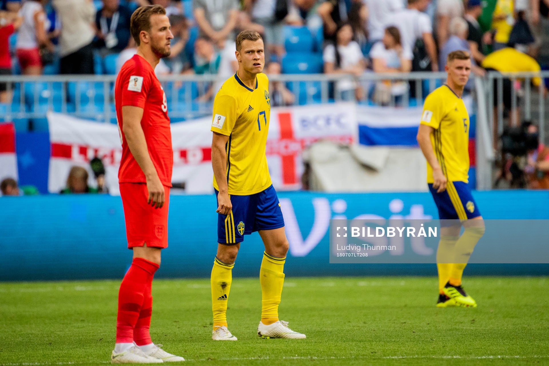 Harry Kane of England and Viktor Claesson of Sweden