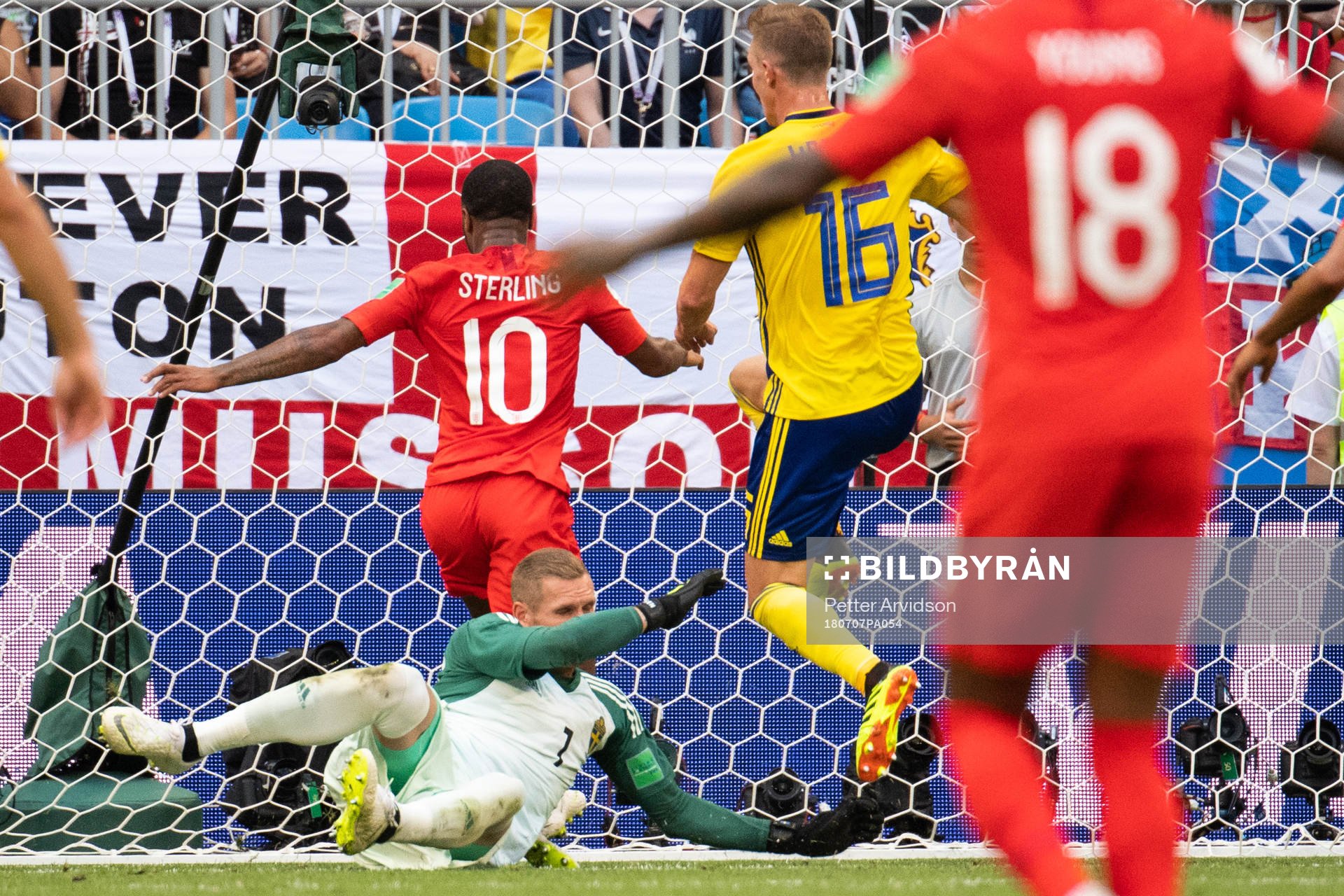 goalkeeper Robin Olsen of Sweden saves a chance from Raheem