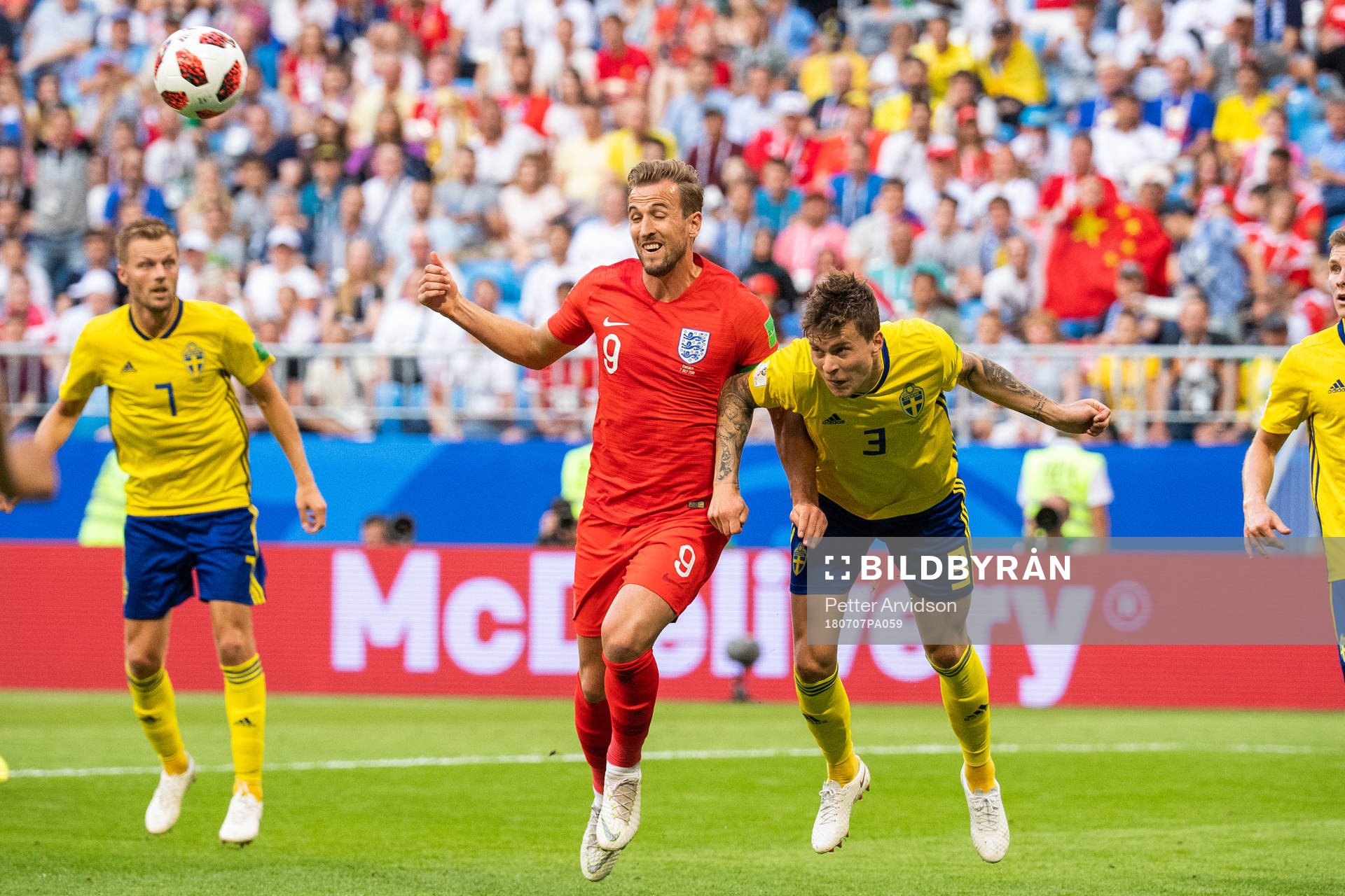 Harry Kane of England and Victor Nilsson Lindelöf of