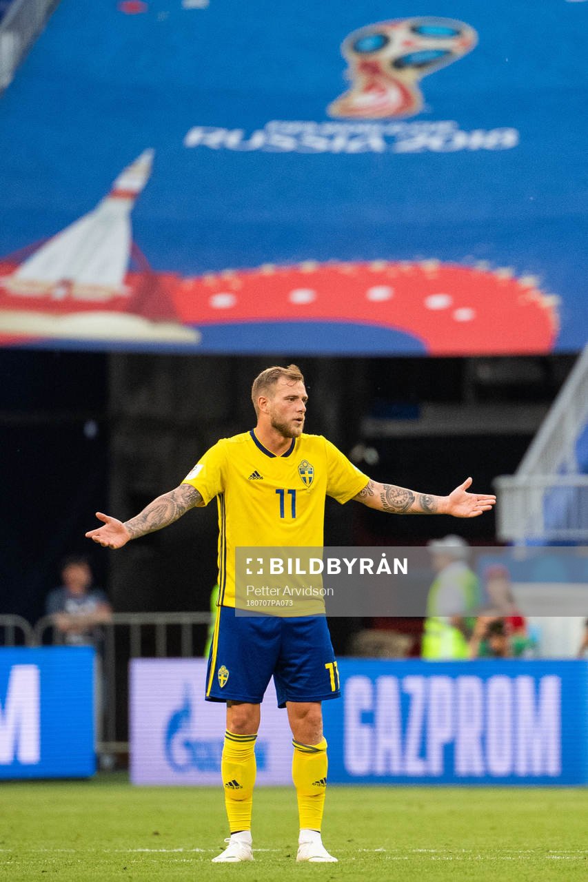 John Guidetti of Sweden reacts
