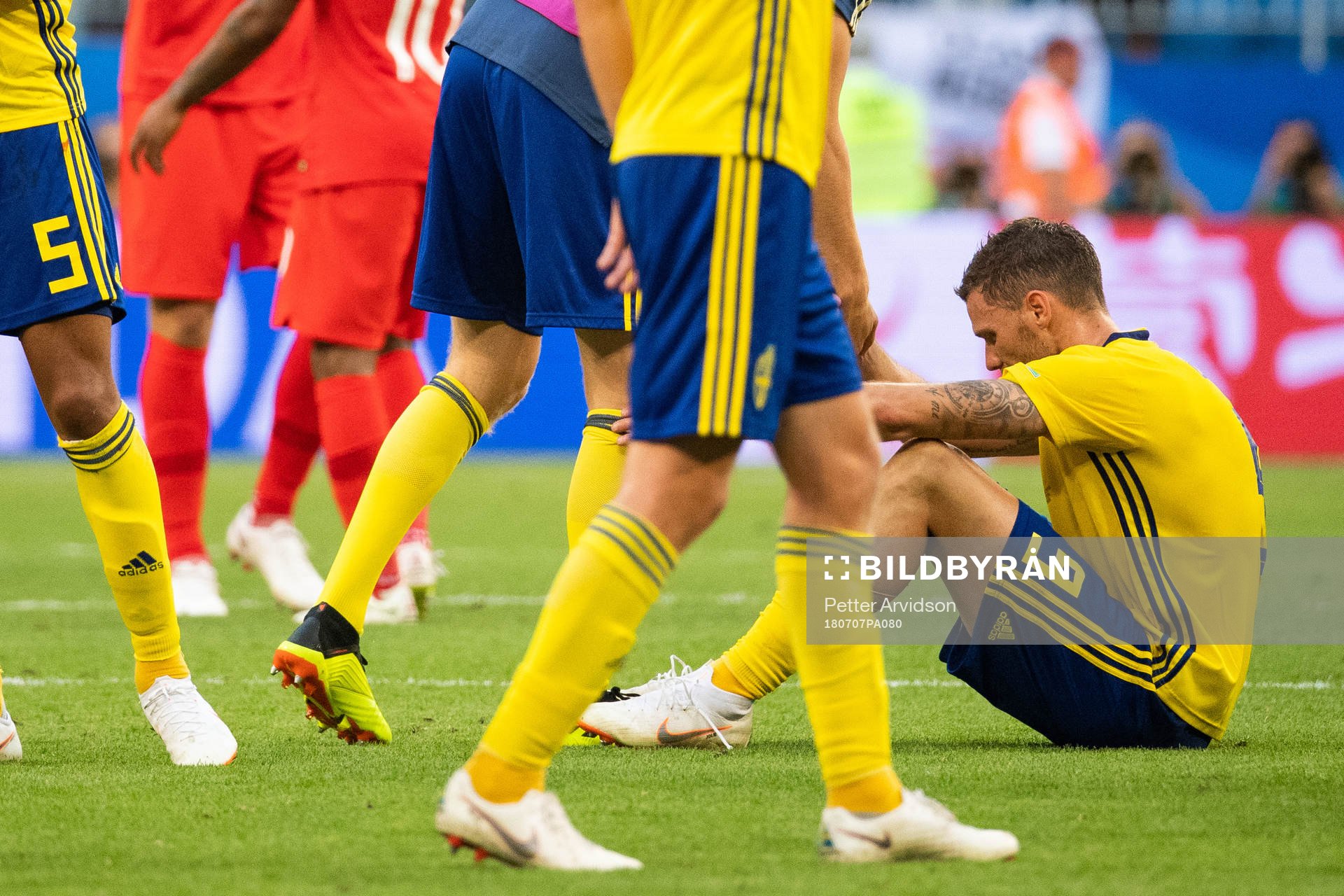 Marcus Berg of Sweden sits down and looks dejected