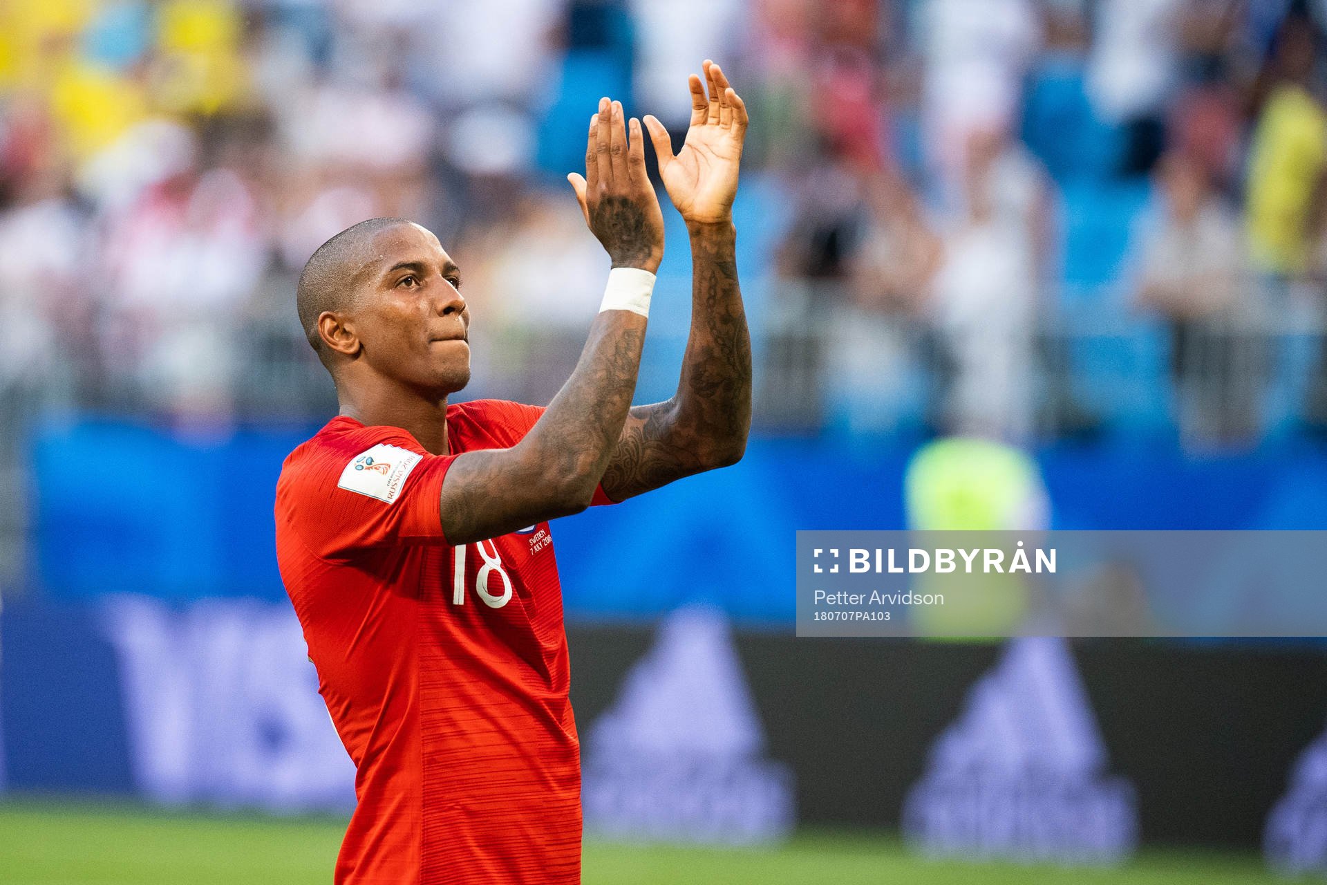 Ashley Young of England celebrates