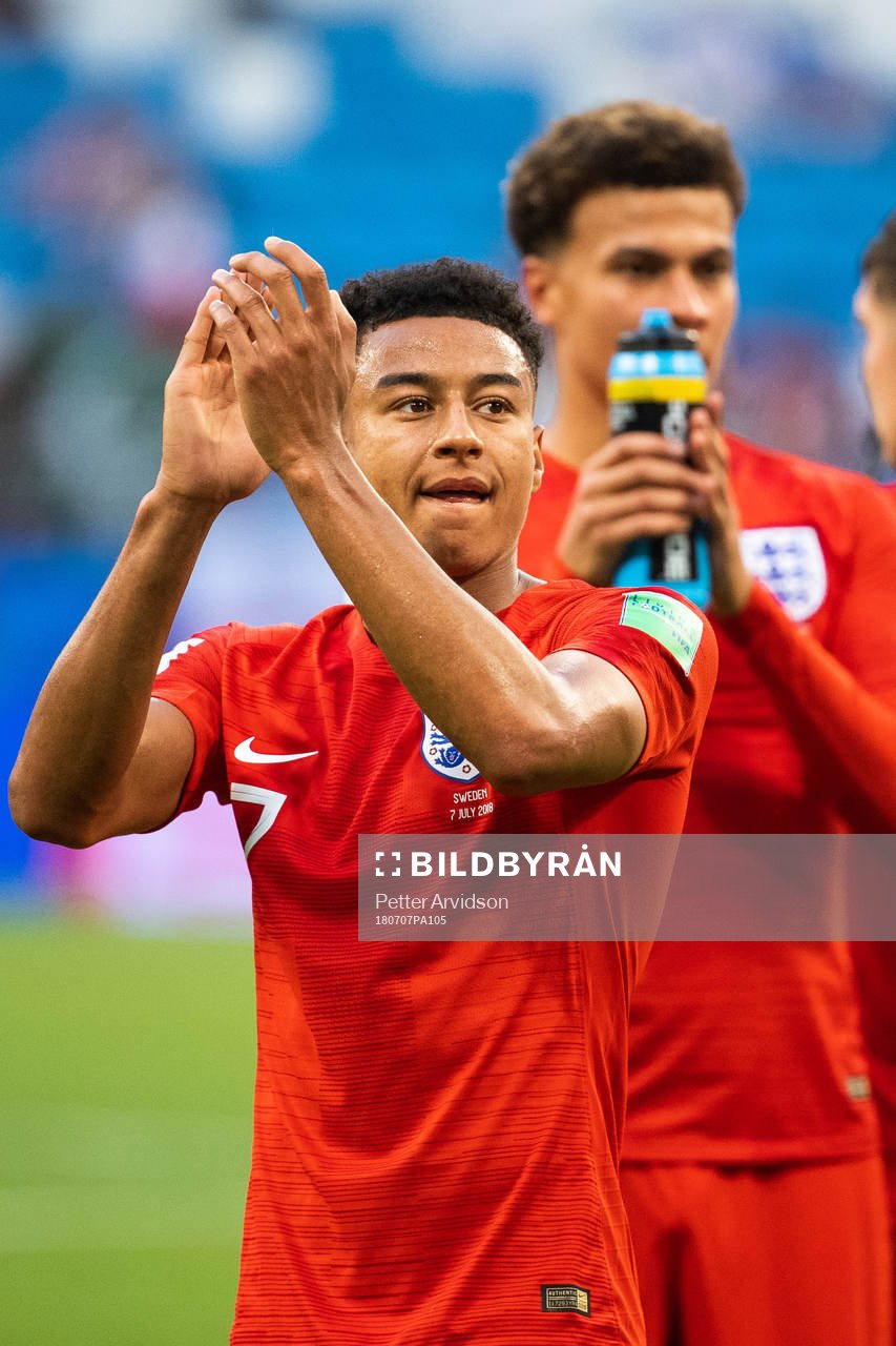 Jesse Lingard of England celebrates