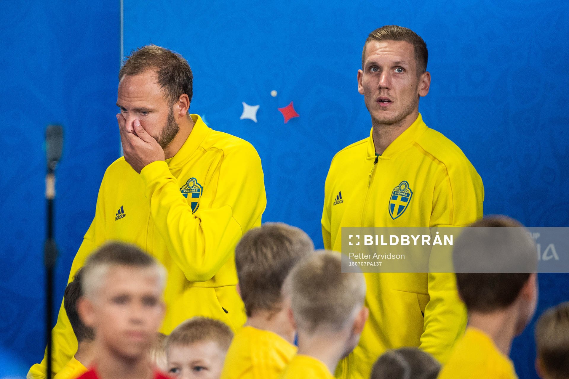 Andreas Granqvist and goalkeeper Robin Olsen of Sweden