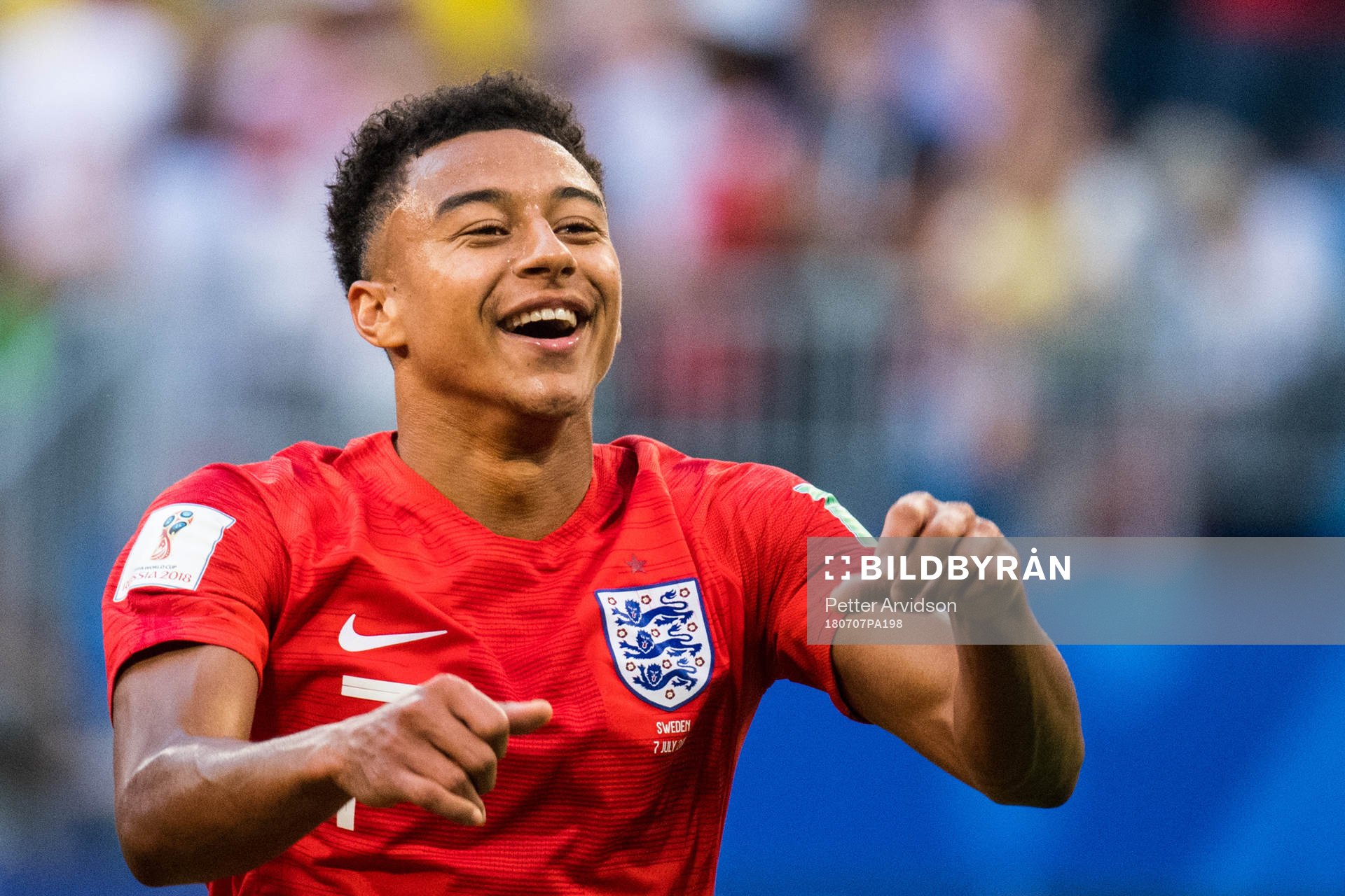 Jesse Lingard of England celebrates