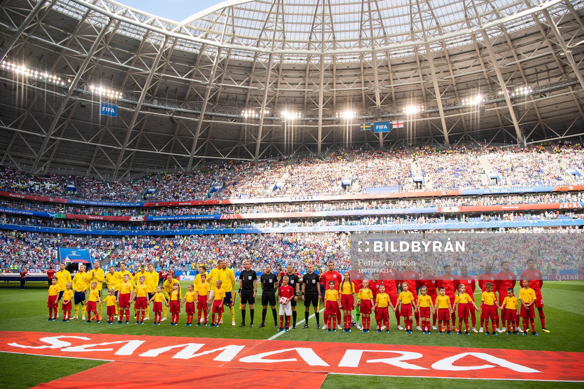 Players of England and of Sweden line up prior to the FIFA
