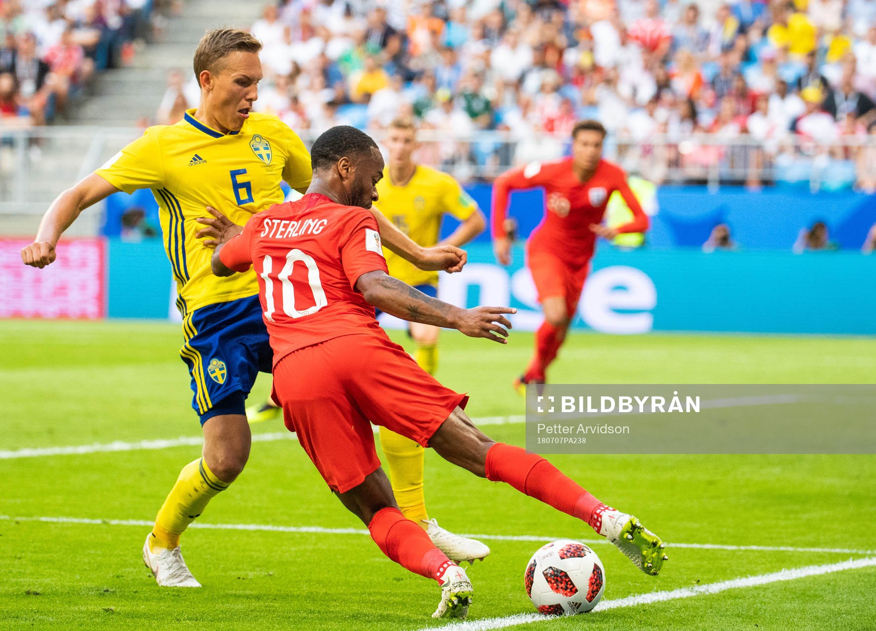 Ludwig Augustinsson of Sweden and Raheem Sterling of