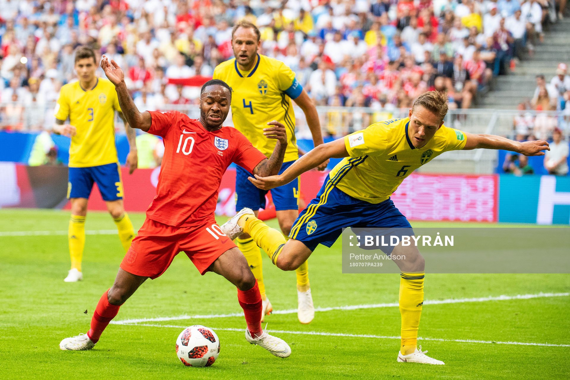 Ludwig Augustinsson of Sweden and Raheem Sterling of