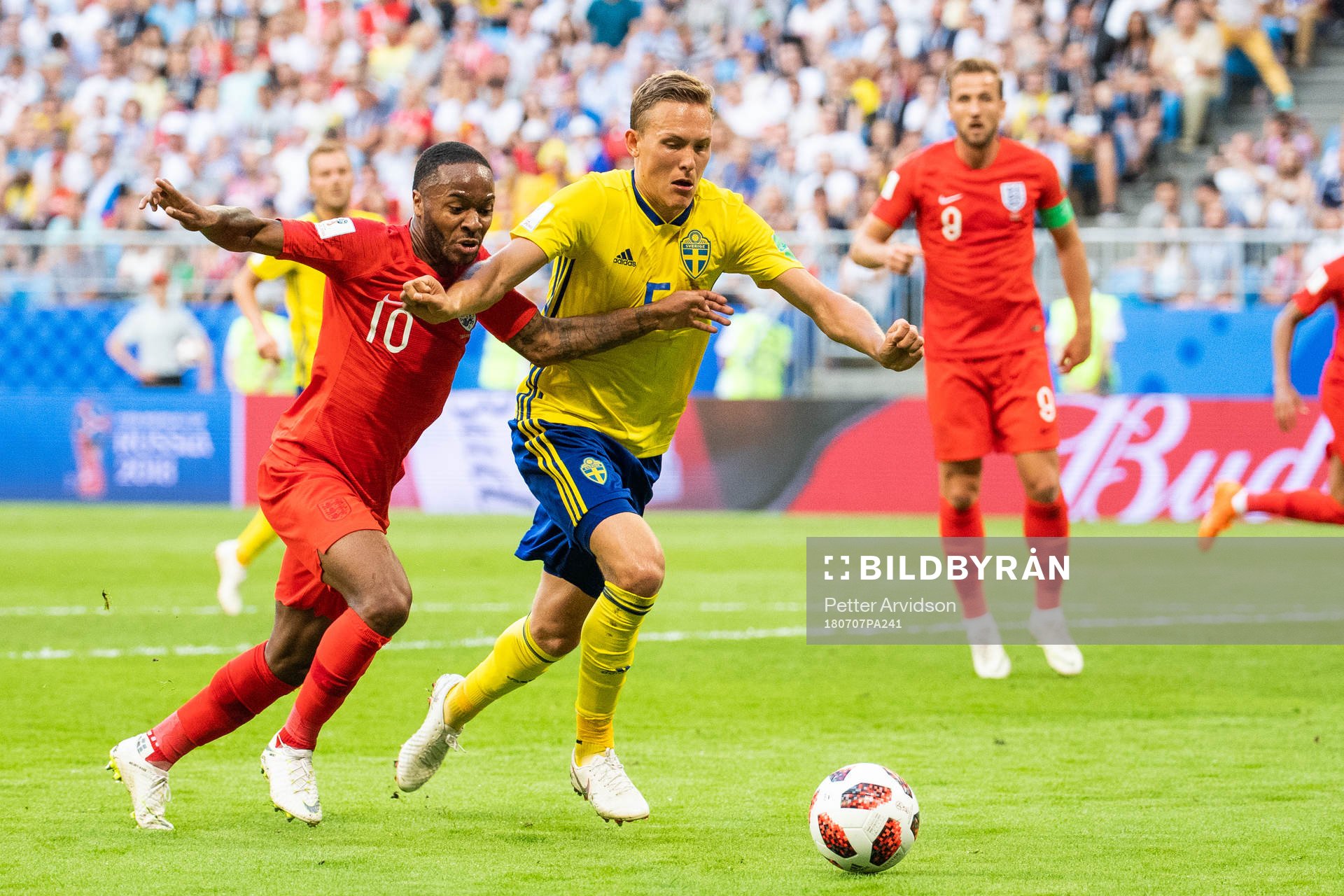 Ludwig Augustinsson of Sweden and Raheem Sterling of