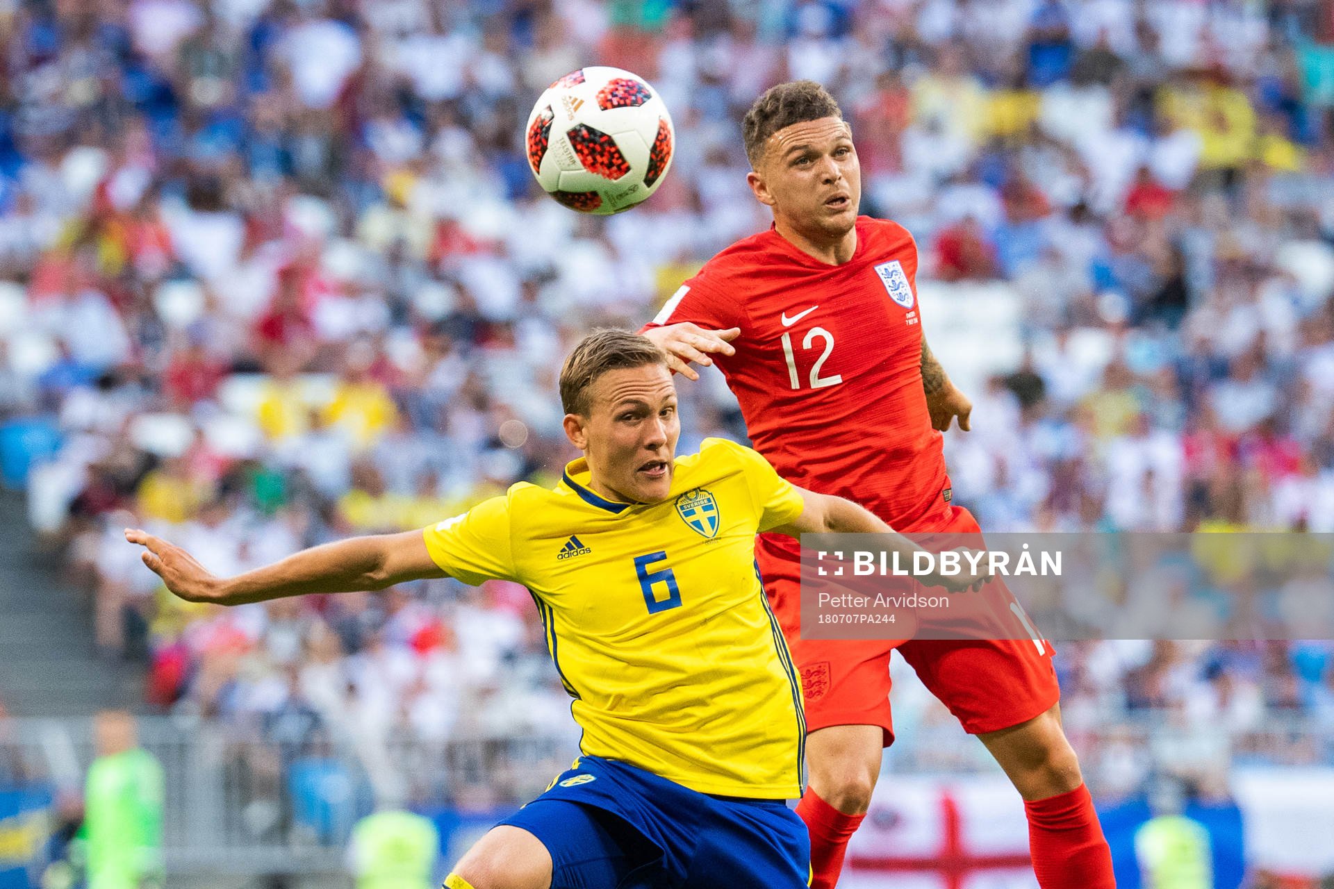 Ludwig Augustinsson of Sweden and Kieran Trippier of