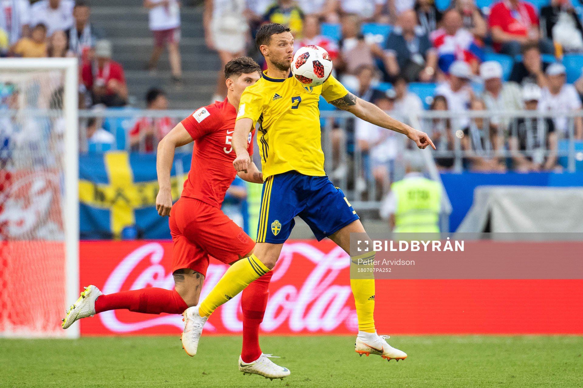 Marcus Berg of Sweden and John Stones of England