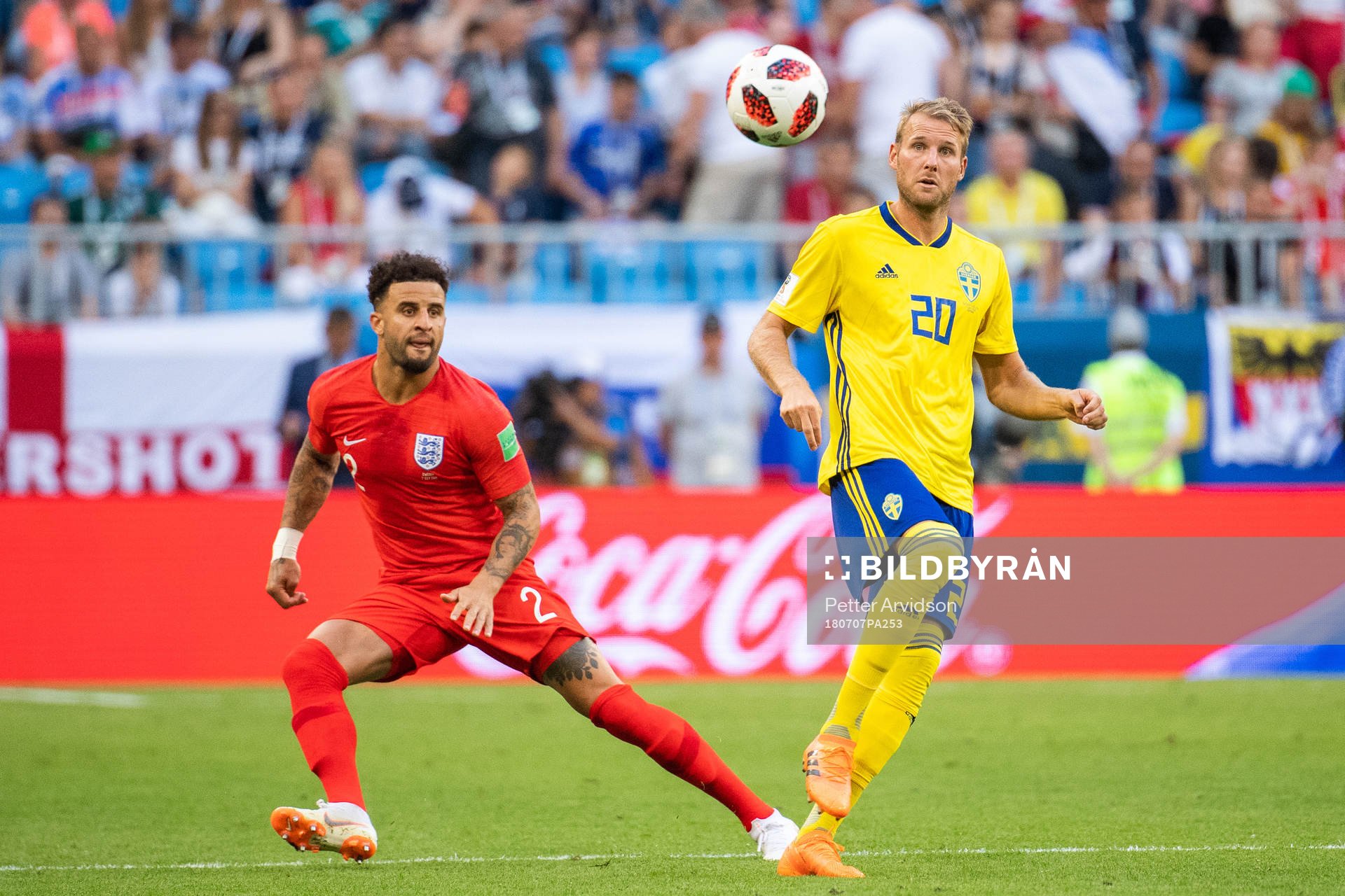Kyle Walker of England and Ola Toivonen of Sweden