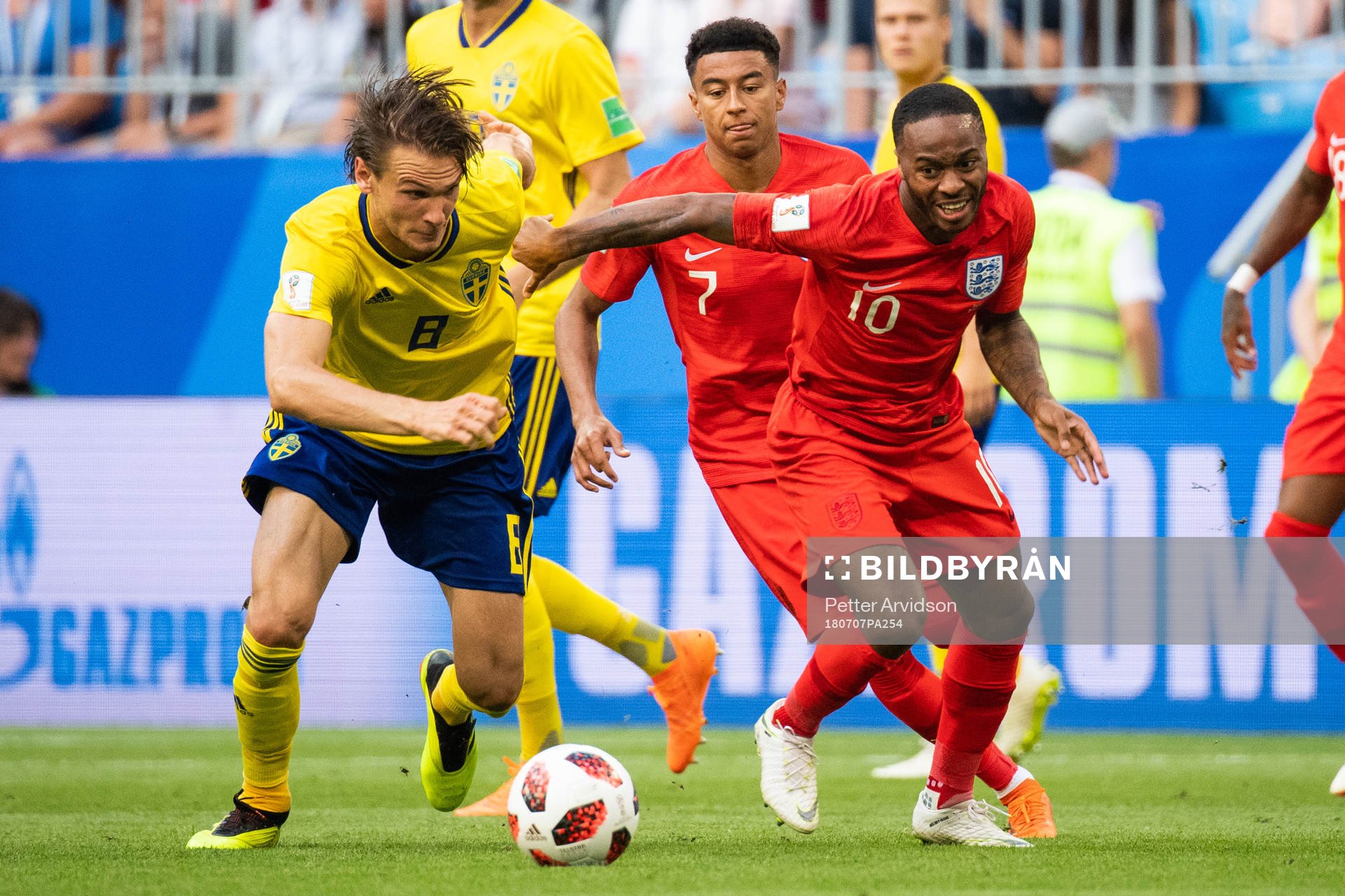 Albin Ekdal of Sweden and Raheem Sterling of England