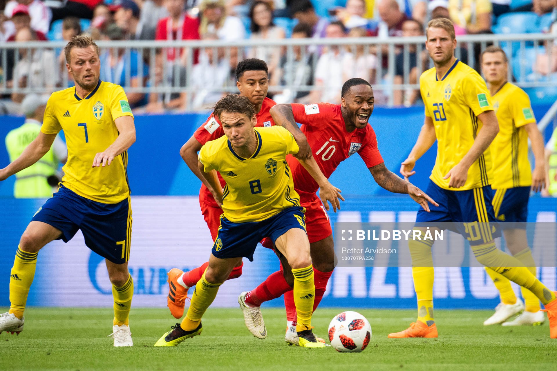 Albin Ekdal of Sweden and Raheem Sterling of England