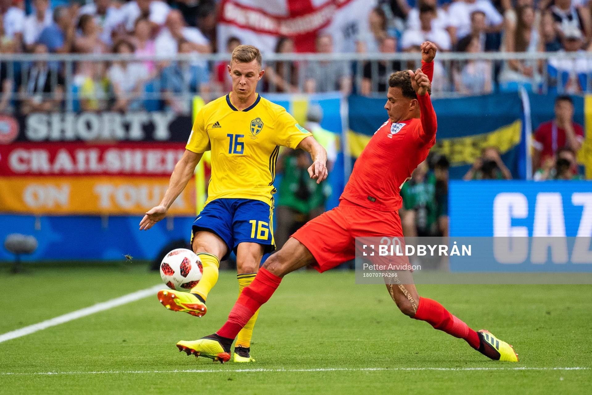 Emil Krafth of Sweden and Dele Alli of England