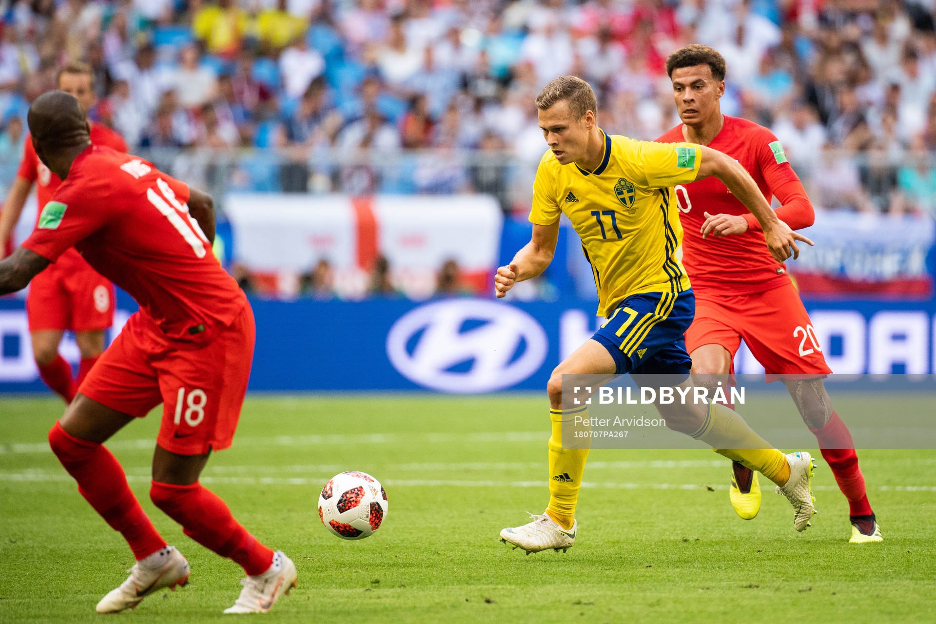Viktor Claesson of Sweden and Dele Alli of England