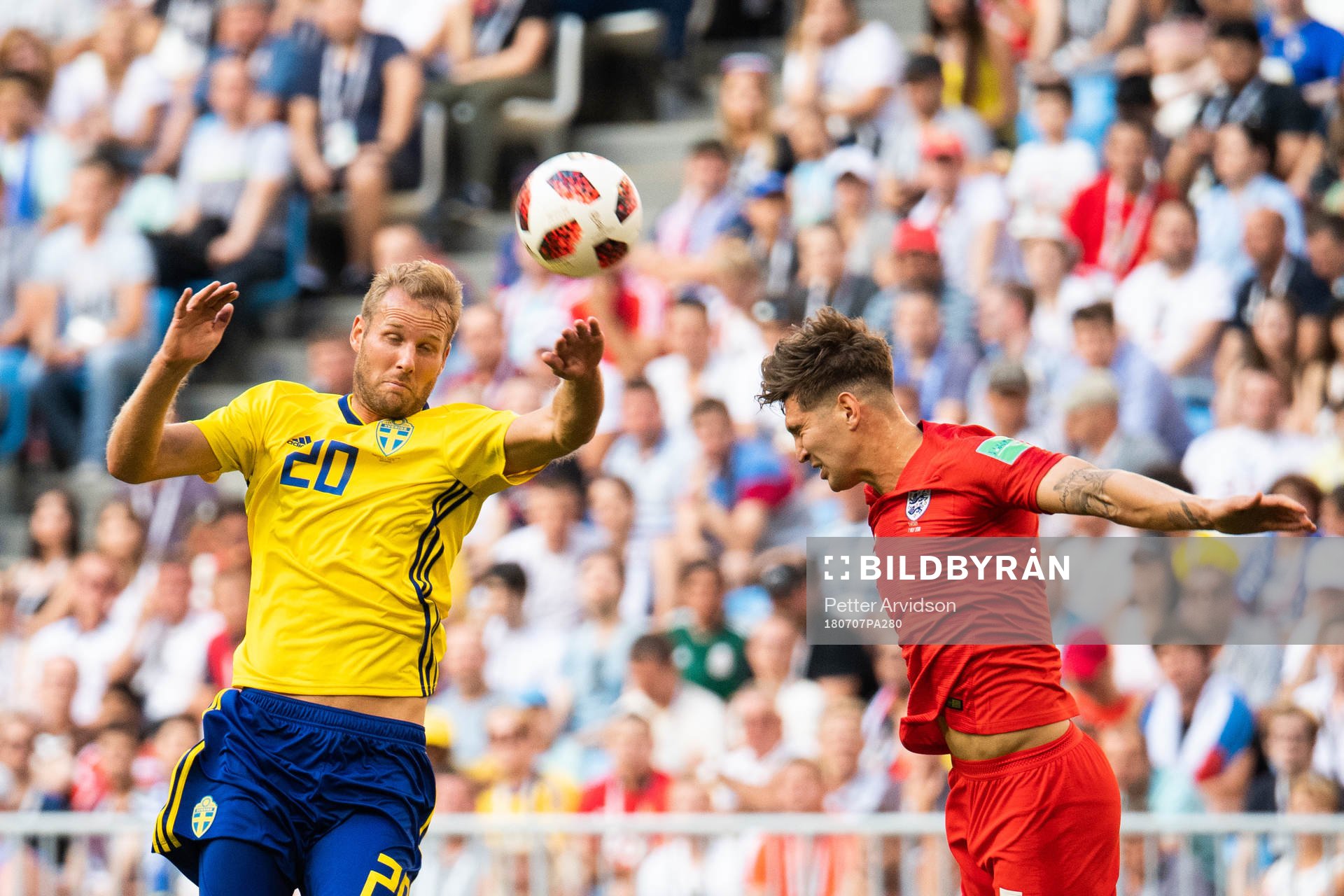 Ola Toivonen of Sweden and John Stones of England