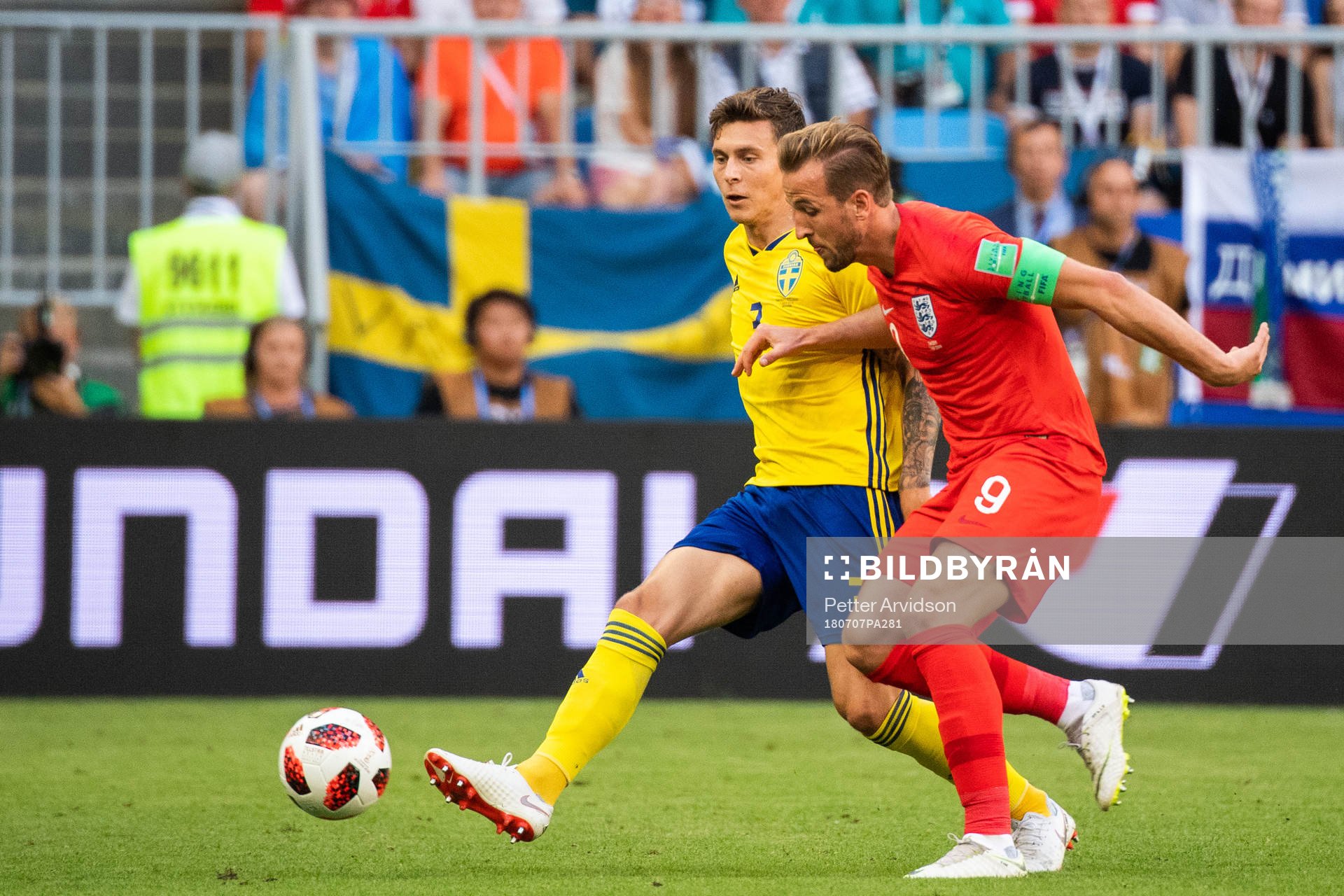 Victor Nilsson Lindelöf of Sweden adn Harry Kane of