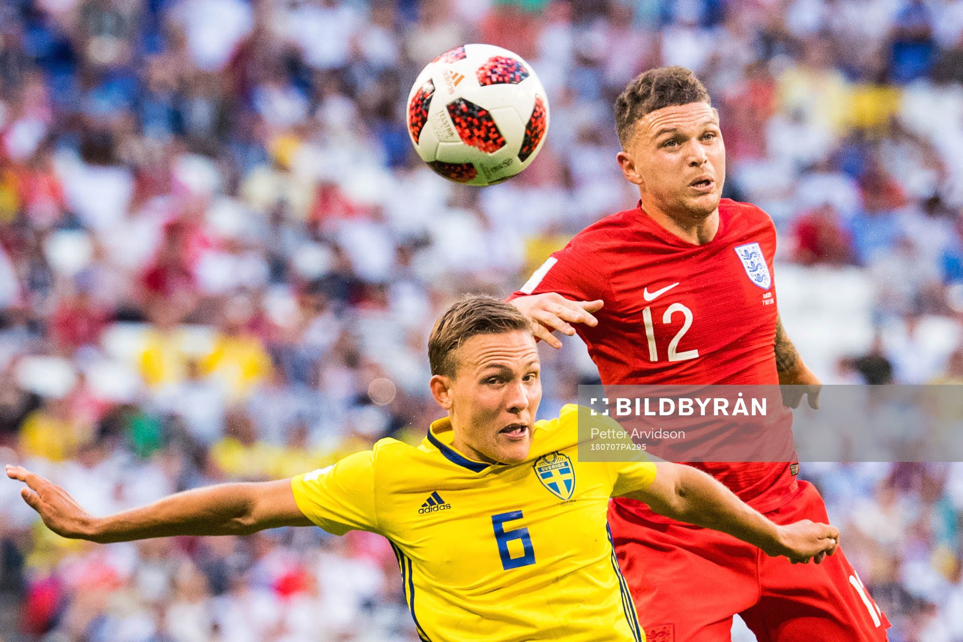 Ludwig Augustinsson of Sweden and Kieran Trippier of England