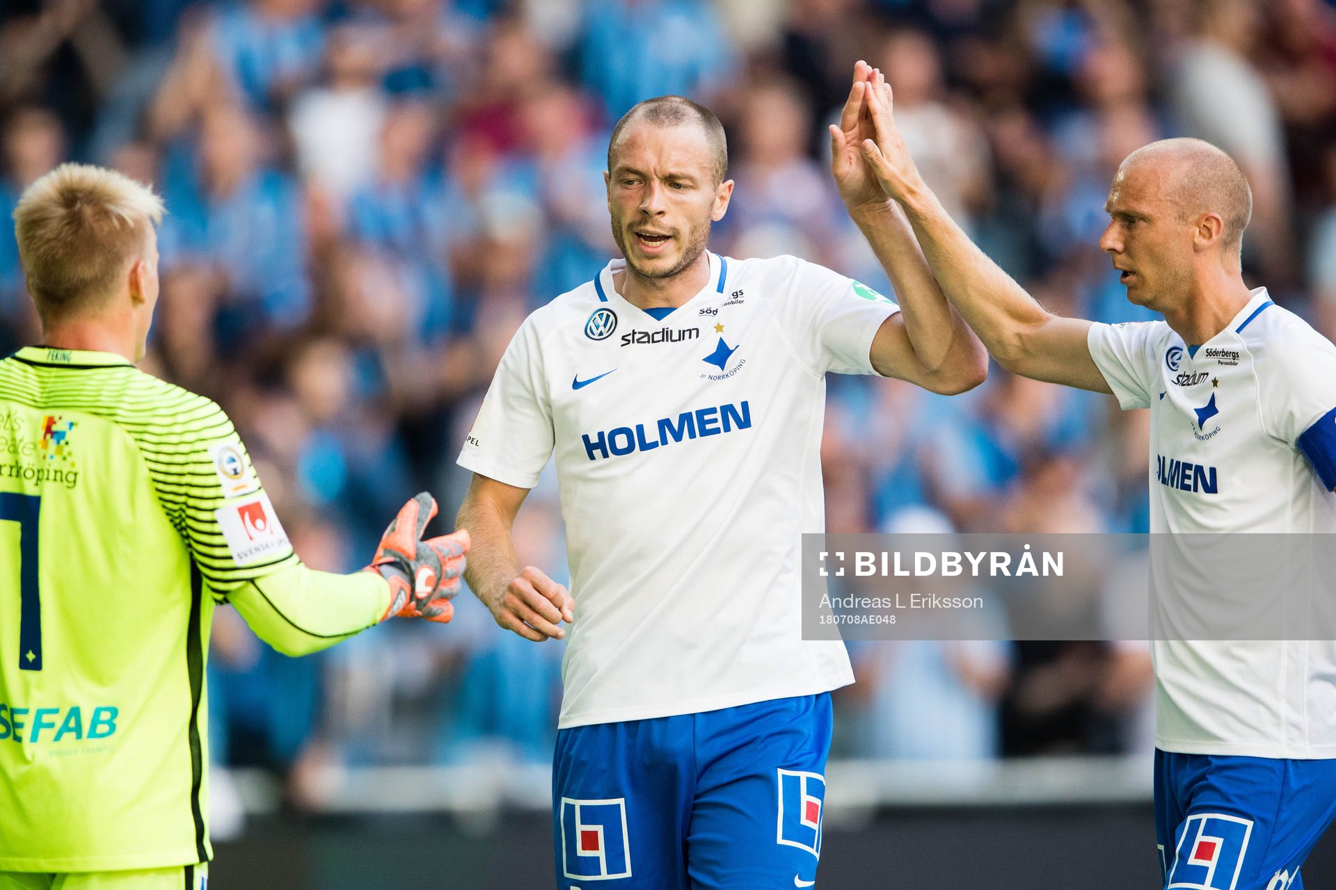 Norrköpings målvakt Isak Pettersson, Jón Gudni Fjóluson och Andreas Johansson jublar under fotbollsmatchen i Allsvenskan mellan Djurgården och Norrköping den 8 juli 2018 i Stockholm.