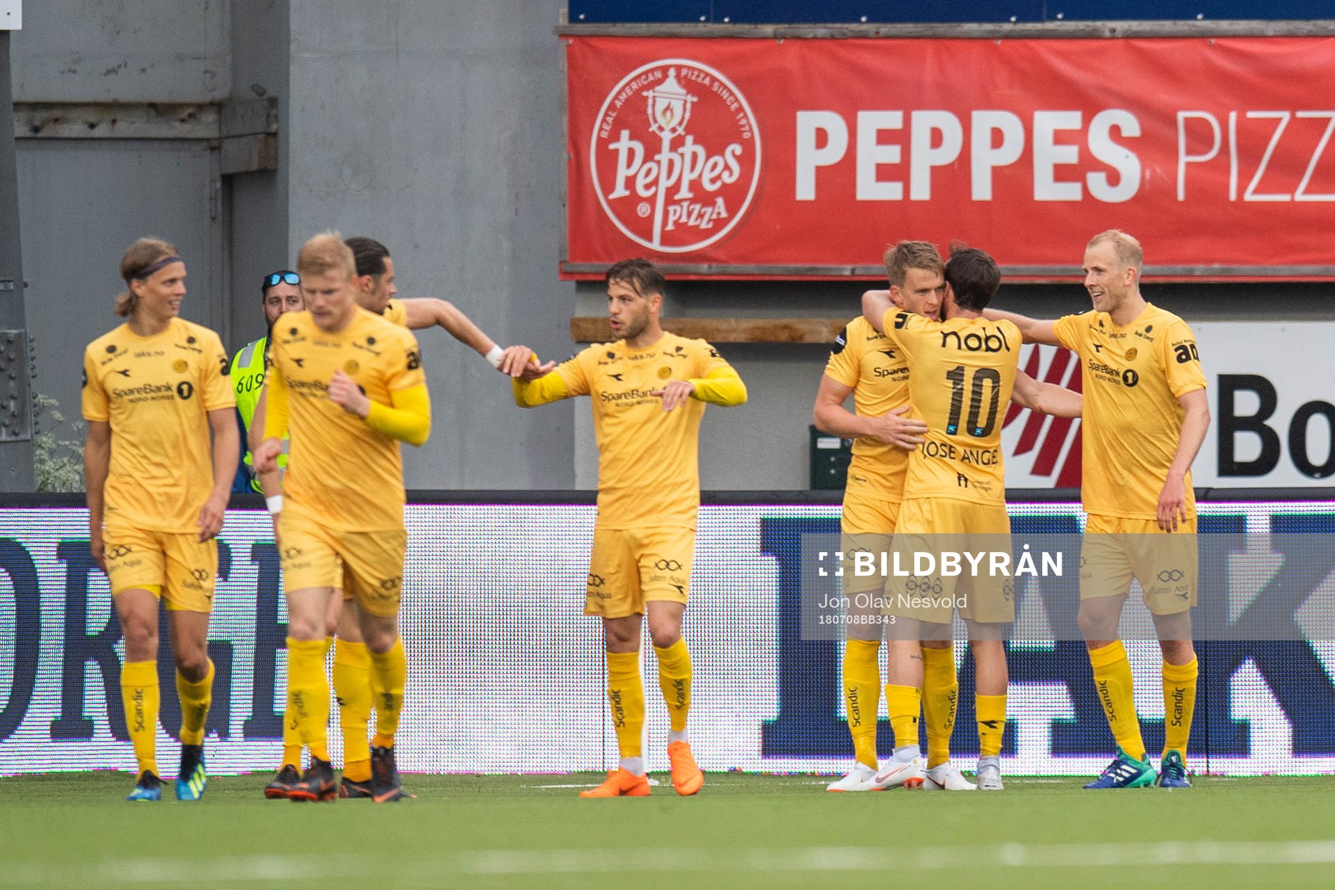 Kristian Fardal Opseth of Bodø/Glimt celebrates with team mates after scoring 2-2 during the Eliteserien match between Bodø/Glimt and Brann on July 8, 2018 in Bodø.