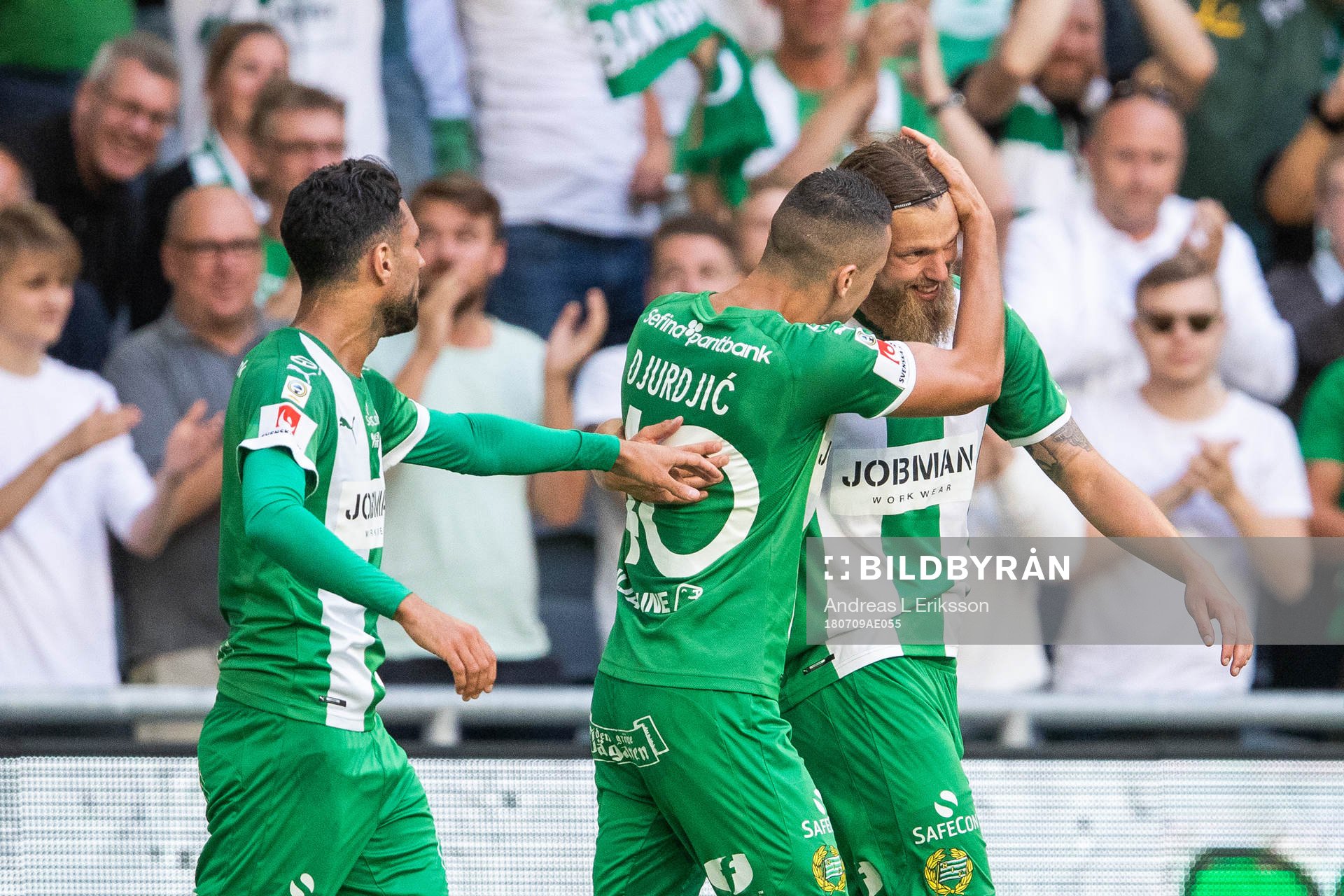 Hammarbys Imad Khalili och Nikola Djurdjic jublar med Björn Paulsen efter att han gjort 1-0-målet under fotbollsmatchen i Allsvenskan mellan Hammarby och Östersund den 9 juli 2018 i Stockholm.