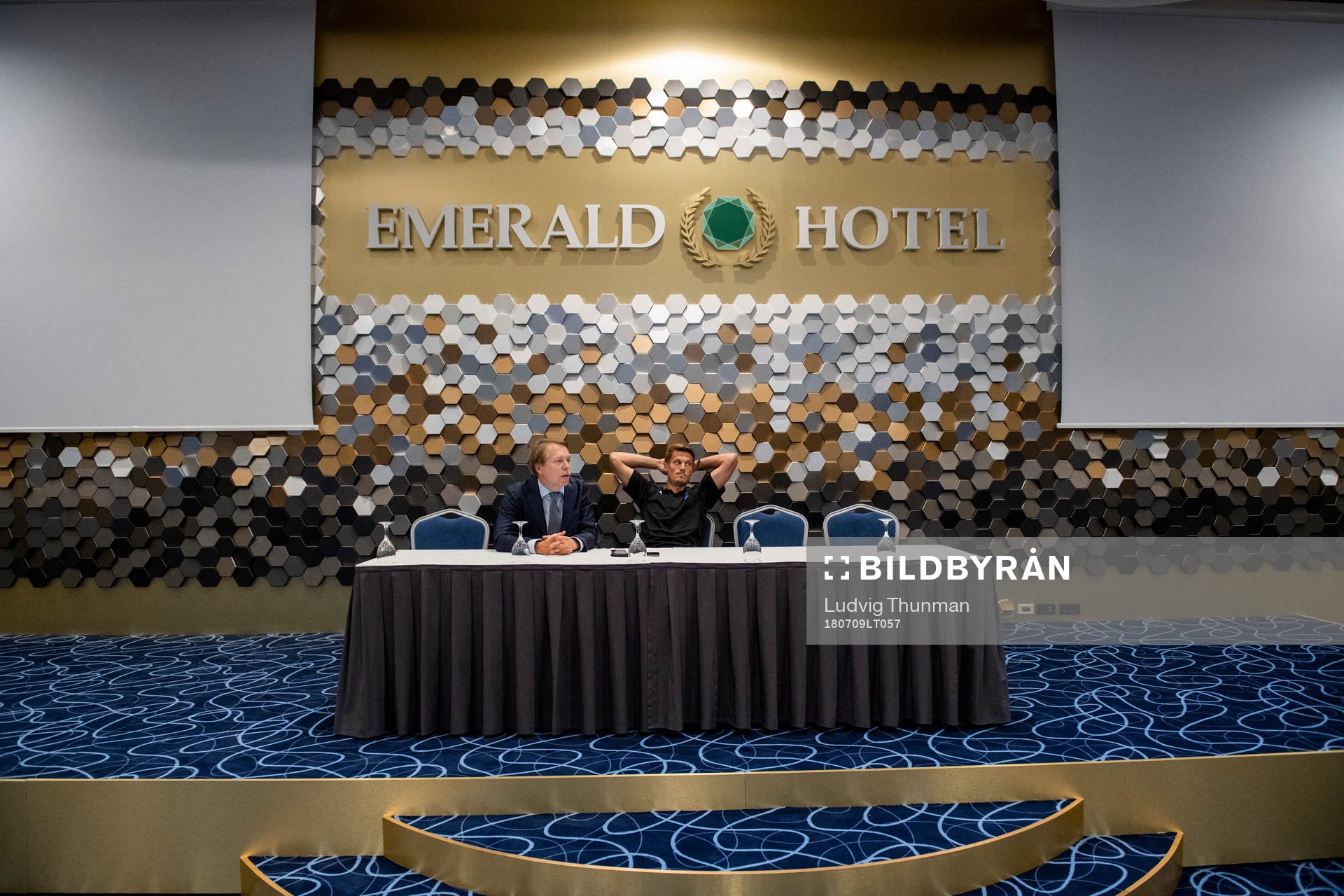 Press officer Peter Åhlander and Markus Rosenberg sits at