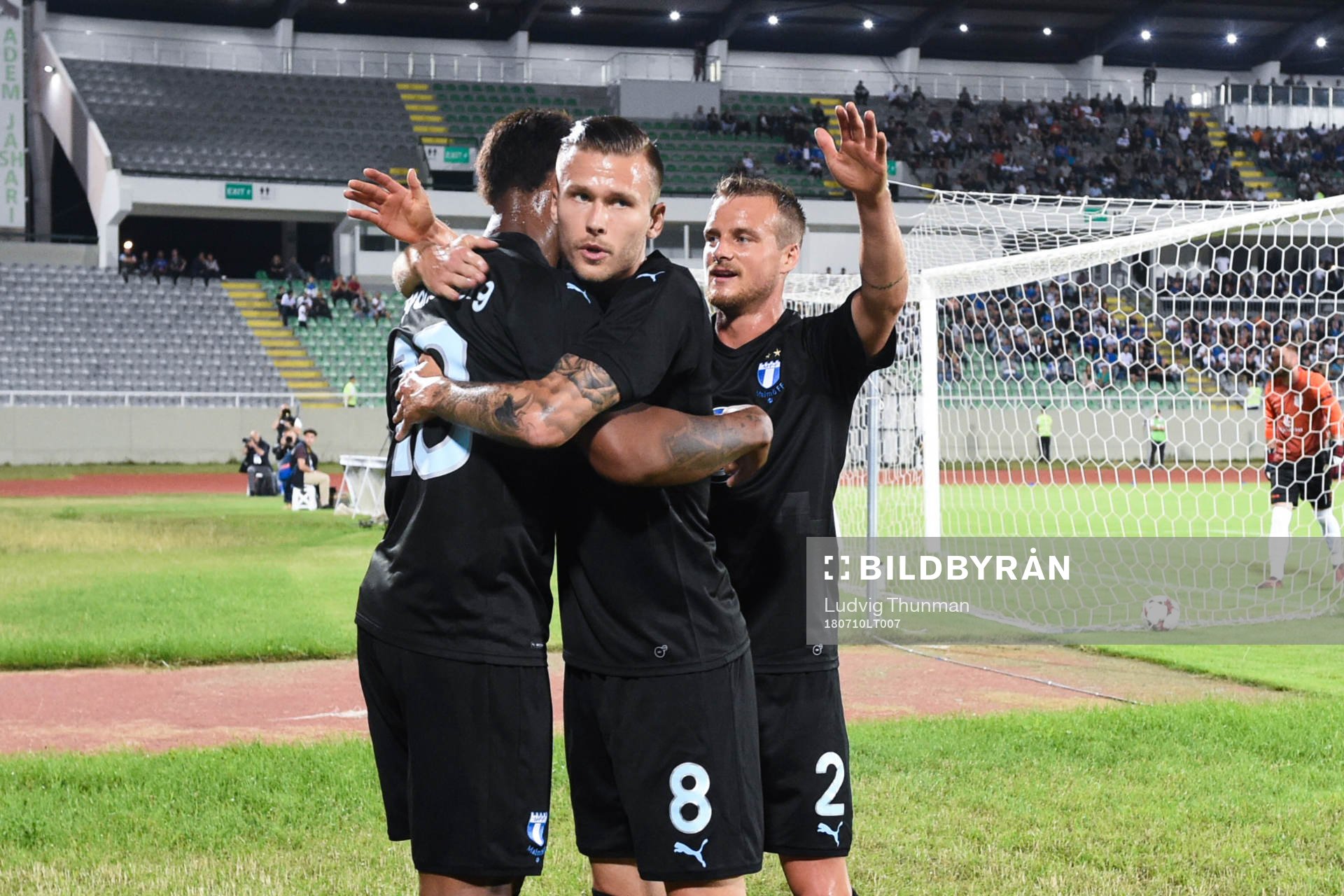 Carlos Strandberg celebrates scoring 0-1 with Arnór Ingvi Traustason and Eric Larsson of Malmö FF during the UEFA Champions League qualifying match between FC Drita and Malmö FF on July 10, 2018 in Pristina.