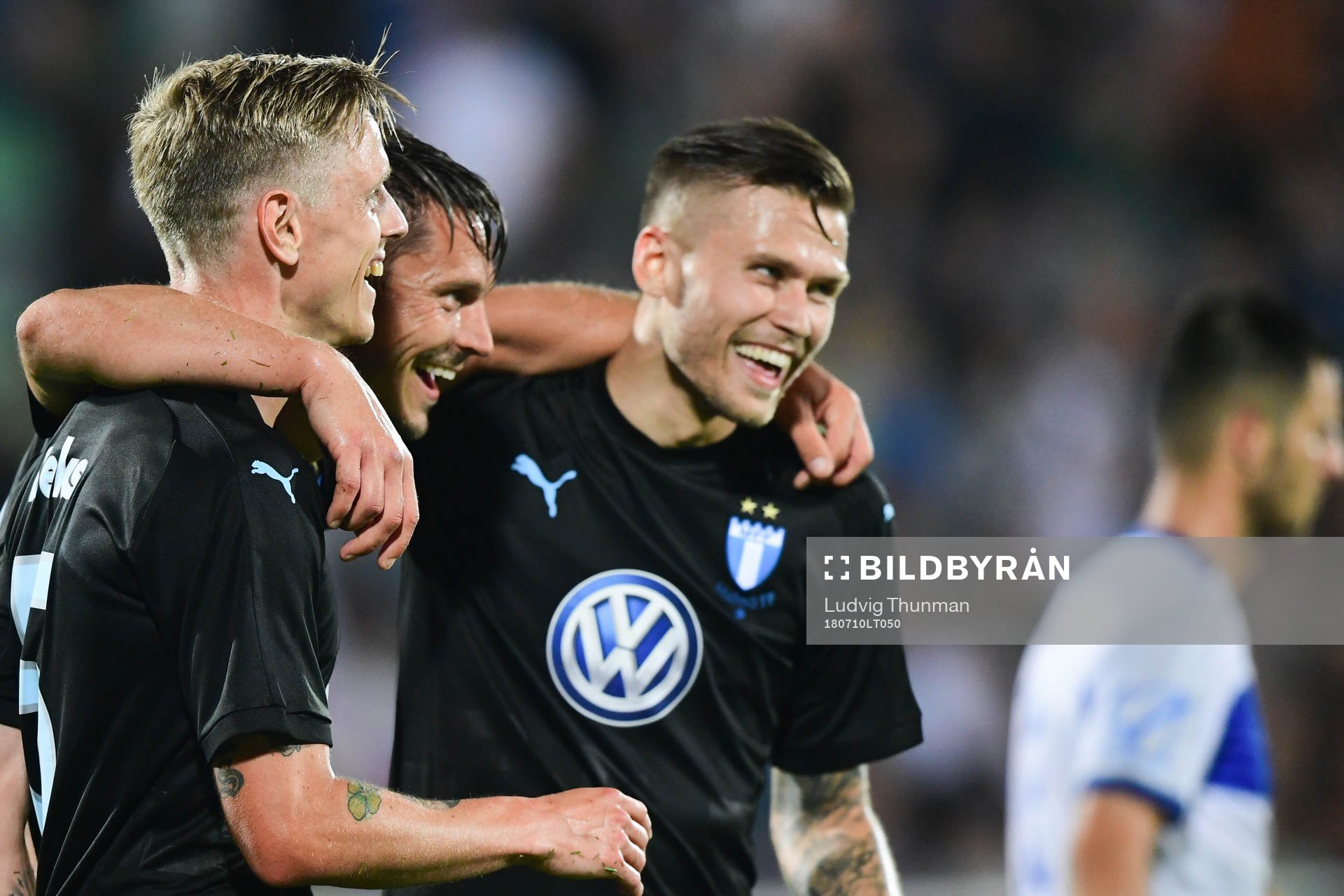 Sören Rieks celebrates with Markus Rosenberg and Arnór