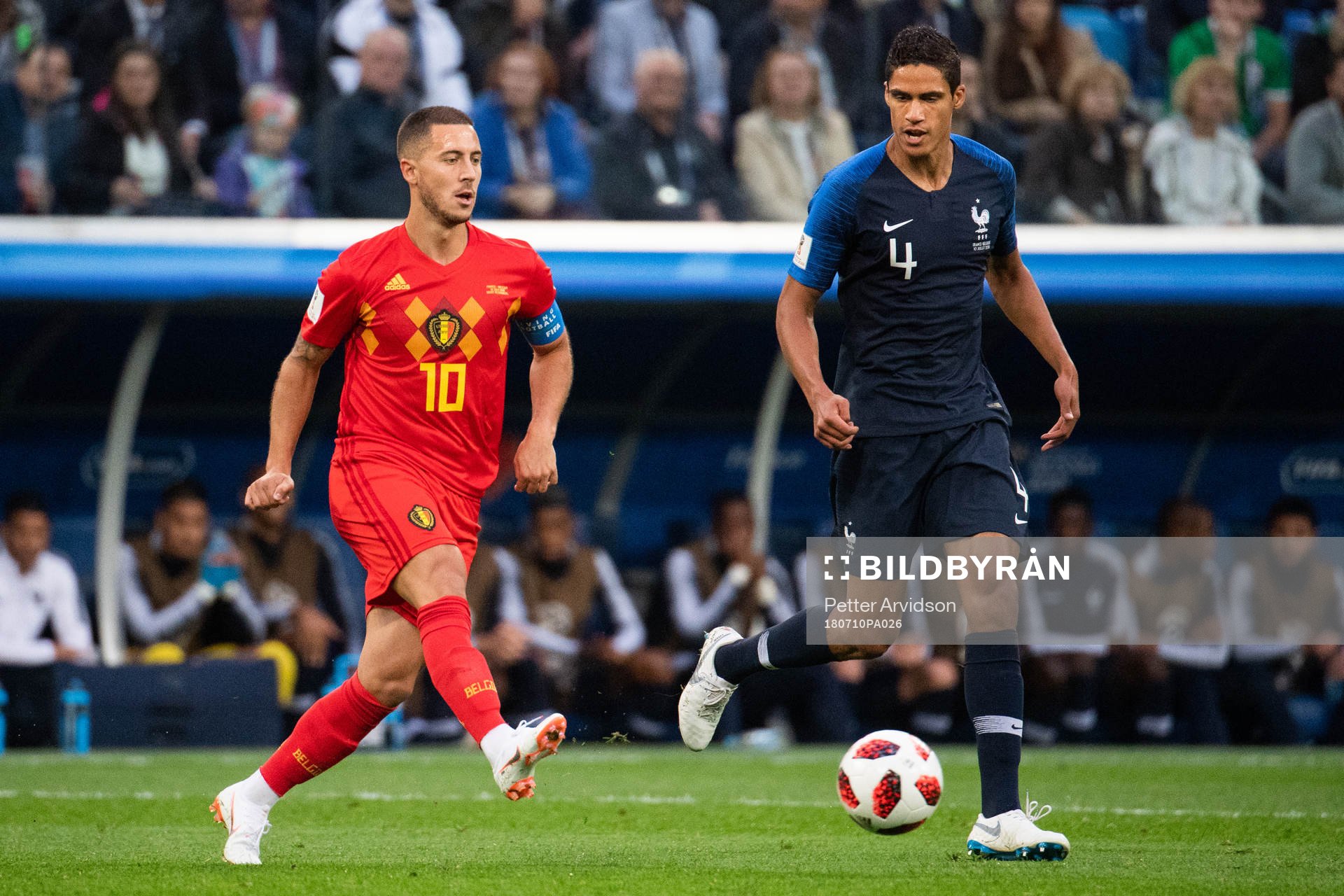 Eden Hazard of Belgium and Raphael Varane of France