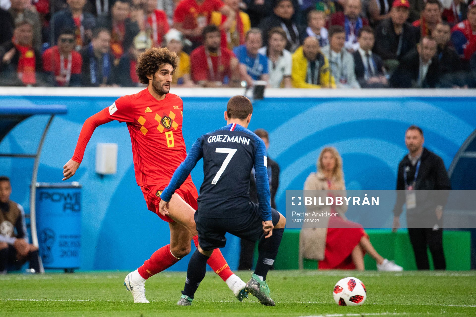 Marouane Fellaini of Belgium and Antoine Griezmann of France