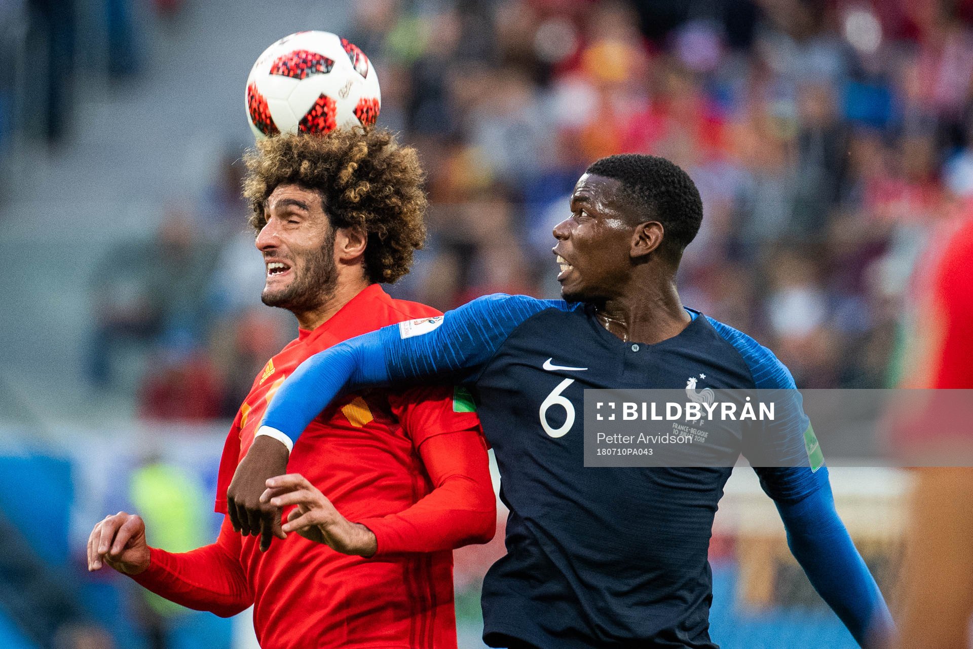 Marouane Fellaini of Belgium and Paul Pogba of France