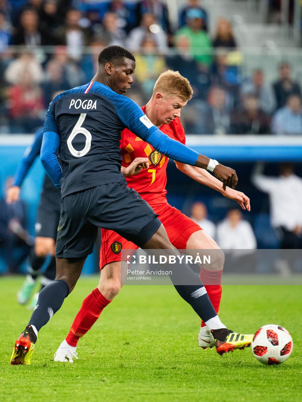 Paul Pogba of France and Kevin De Bruyne of Belgium