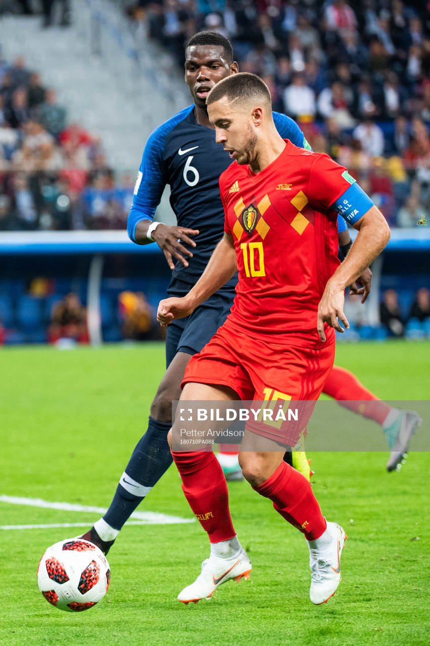 Eden Hazard of Belgium and Paul Pogba of France