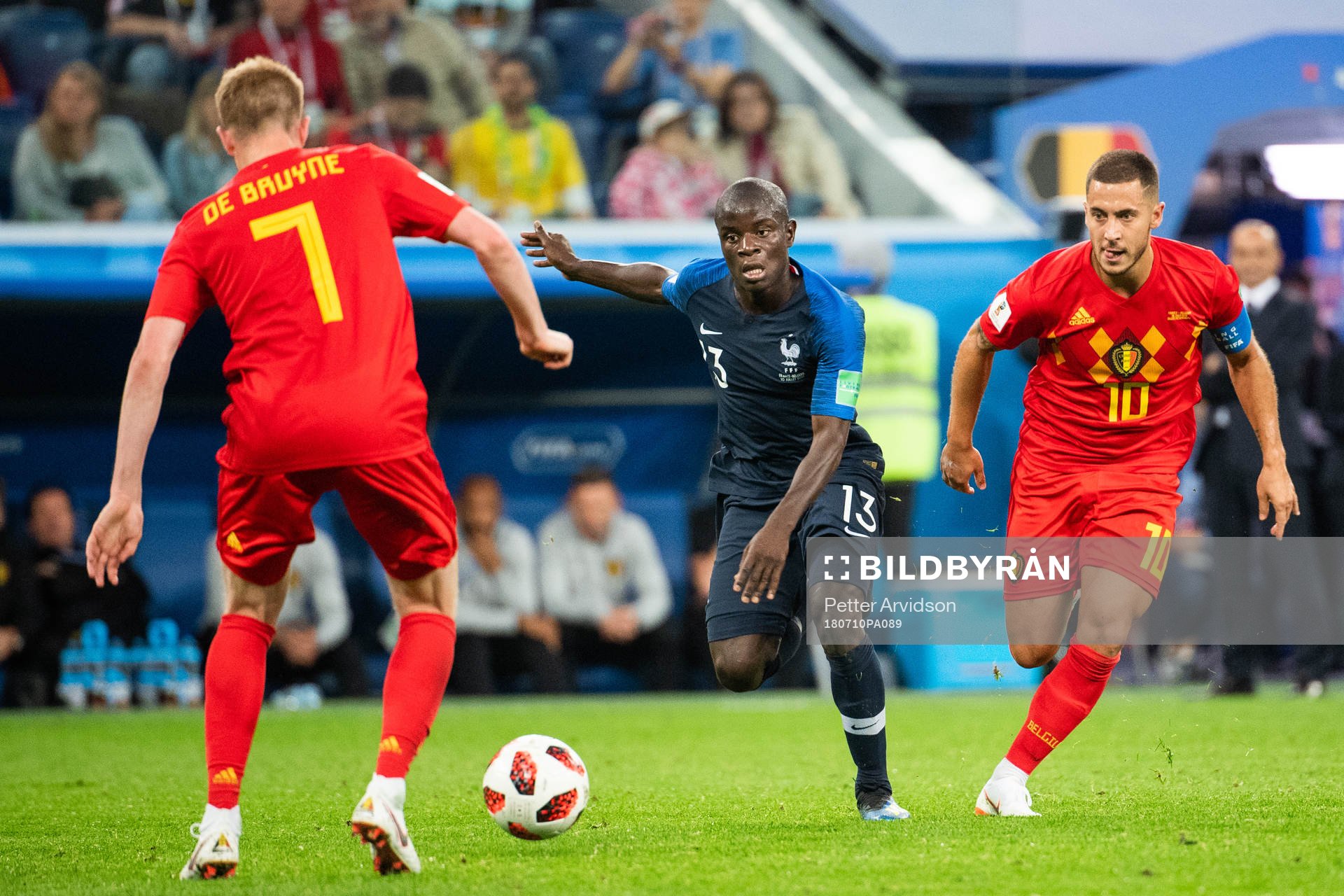 Eden Hazard of Belgium chases Ngolo Kante of France