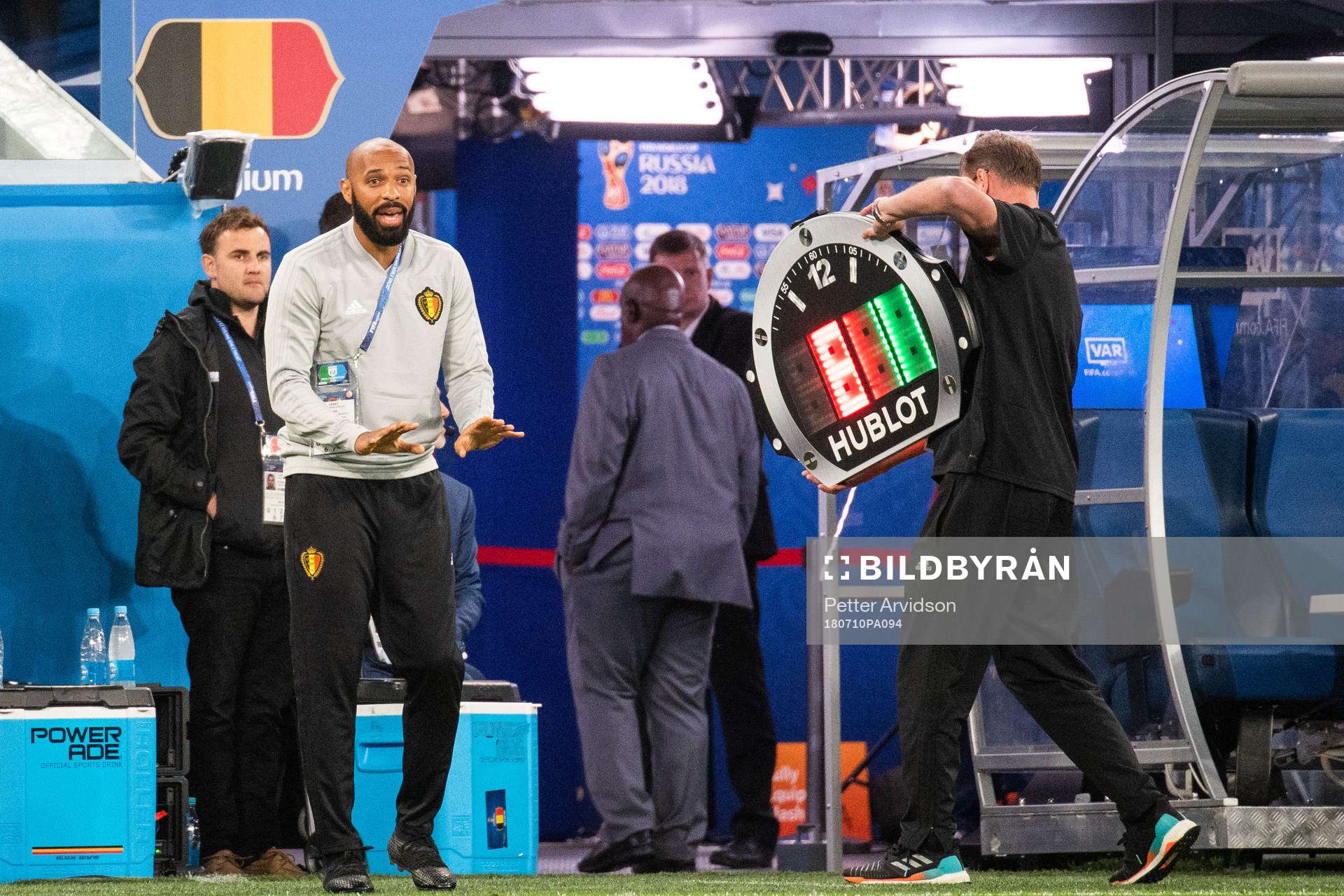 assisting coach Thierry Henry