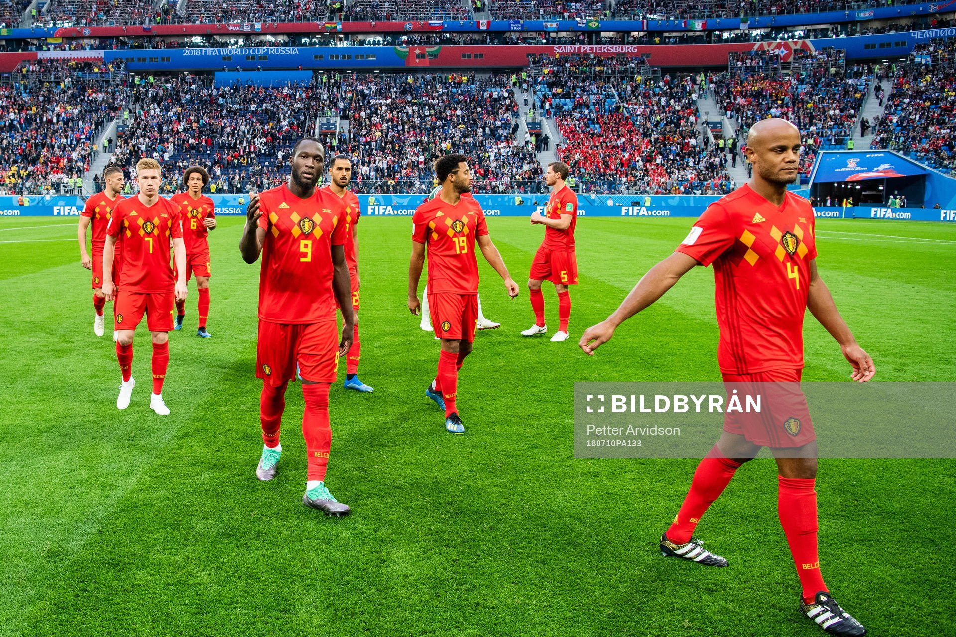 Kevin De Bruyne, Romelu Lukaku and Vincent Kompany looks
