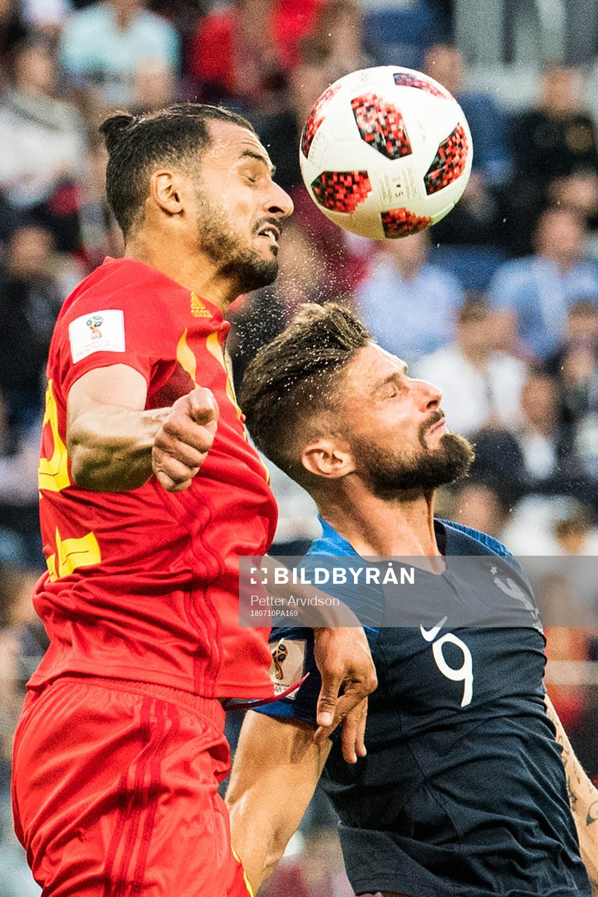 Nacer Chadli of Belgium and Olivier Giroud of France