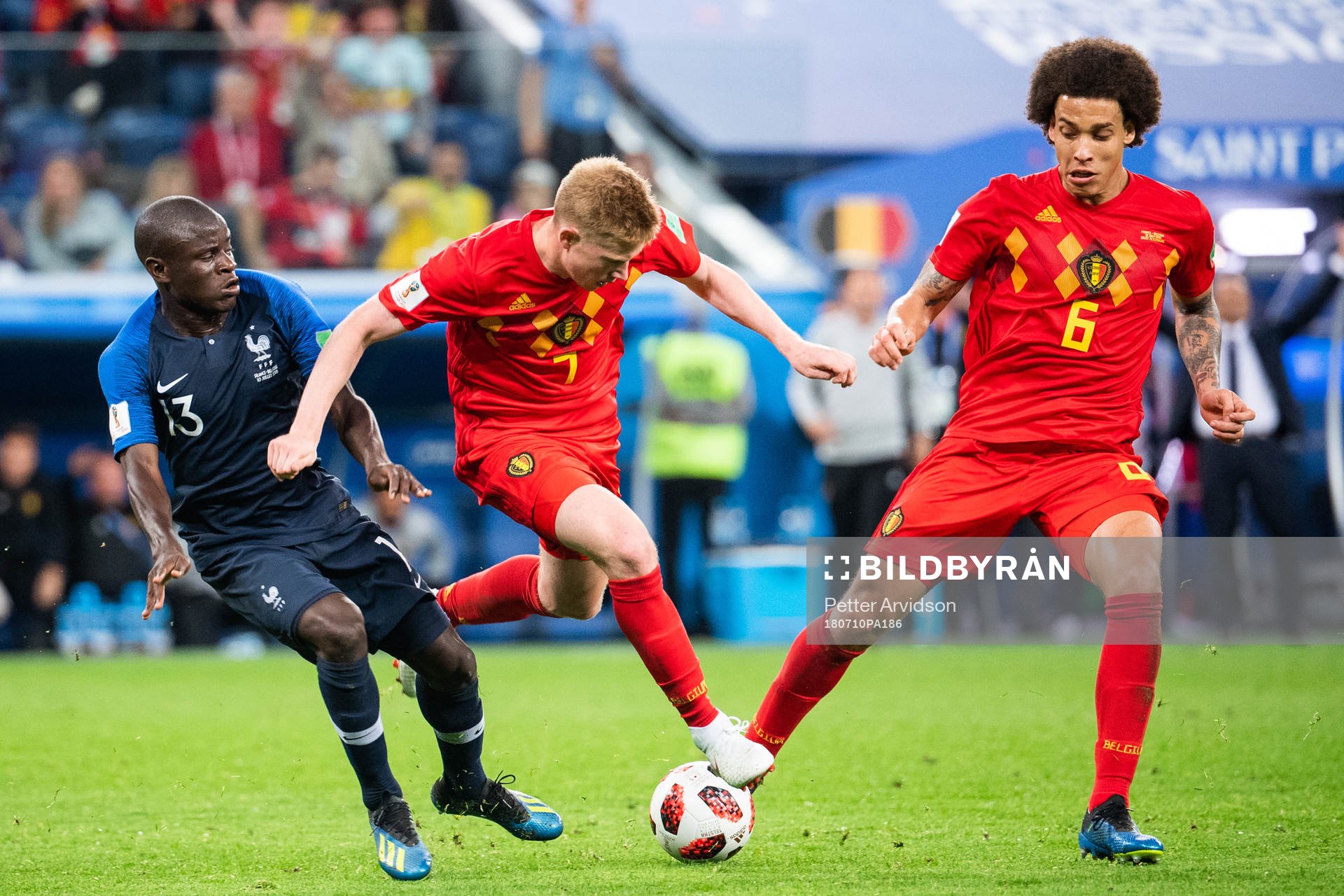 Ngolo Kante of France competes for the ball with Kevin De