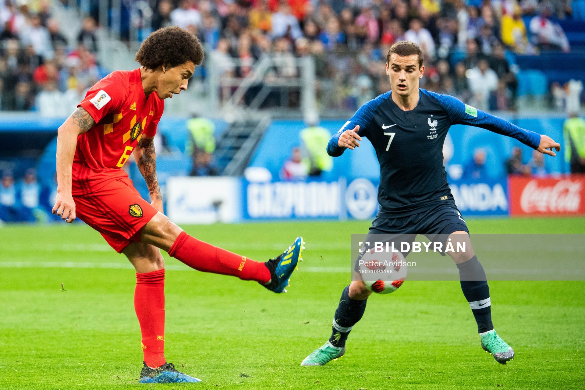 Axel Witsel of Belgium and Antoine Griezmann of France