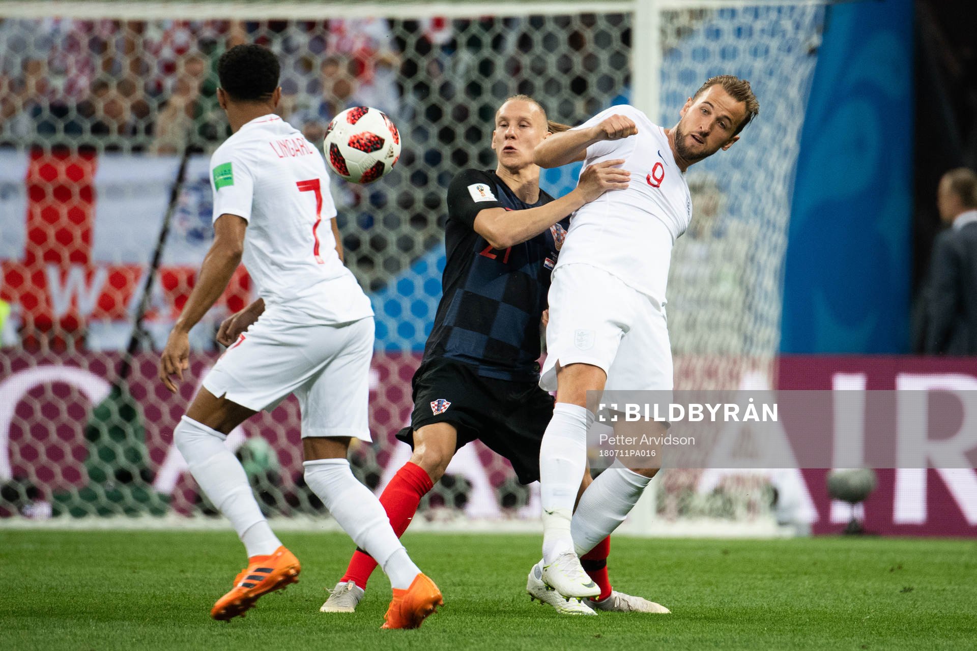 Domagoj Vida of Croatia and Harry Kane of England competes