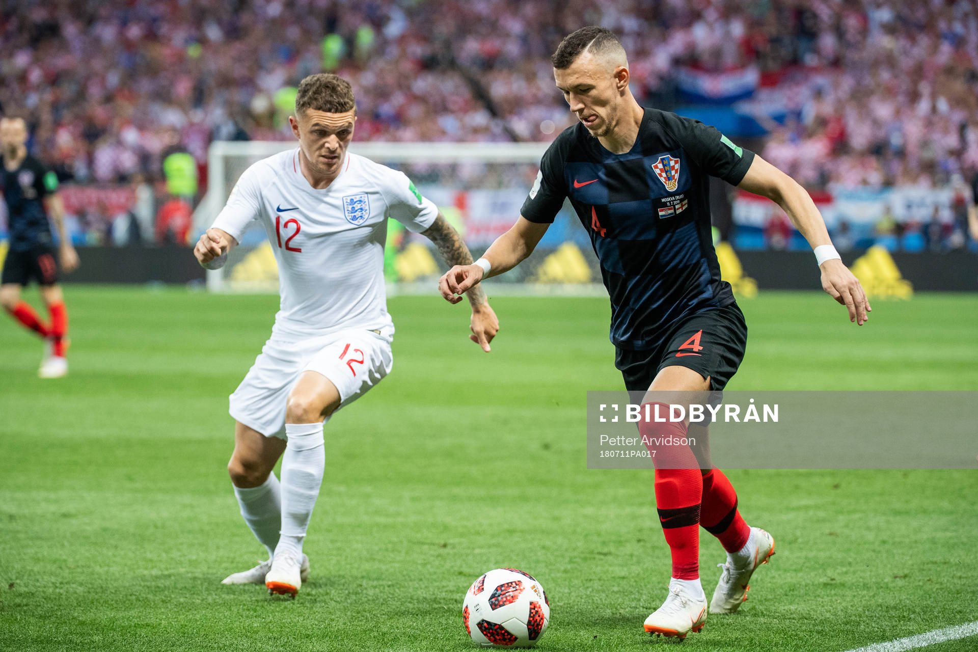 Kieran Trippier of England and Ivan Perisic of Croatia