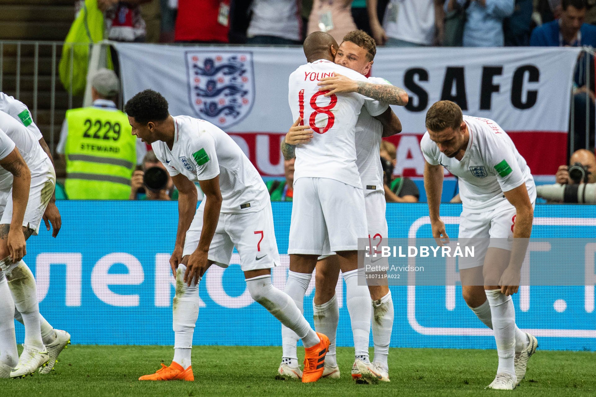 Goal scorer Kieran Trippier and Ashley Young of England