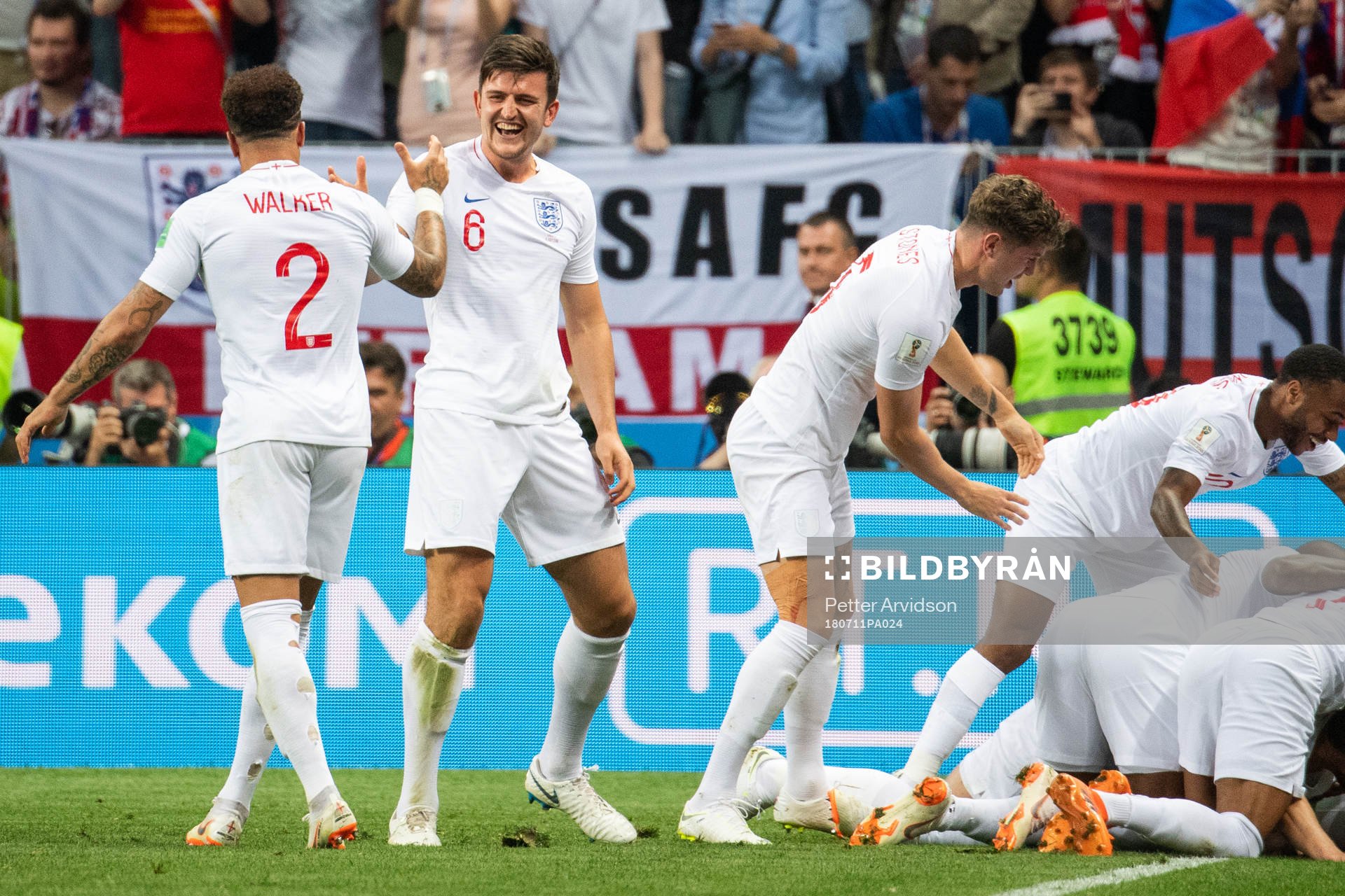 Harry Maguire and Kyle Walker celebrate