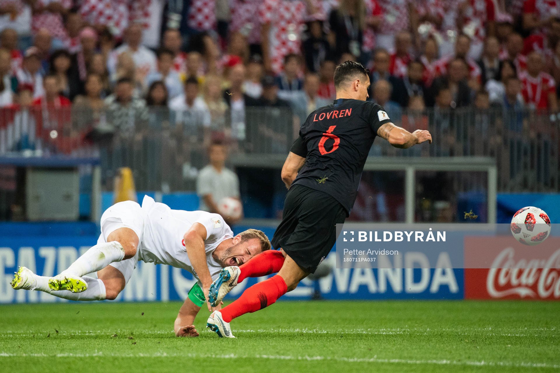 Harry Kane of England falls
