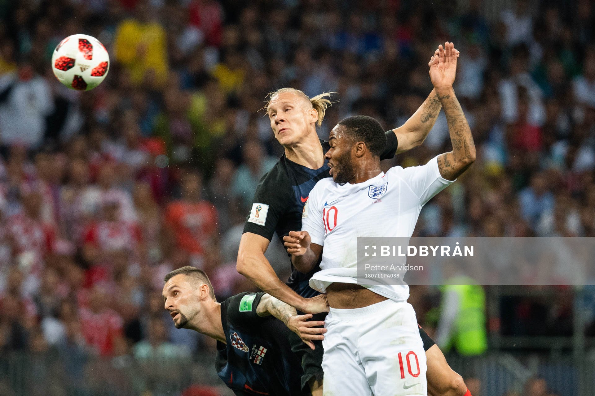 Mario Mandzukic and Domagoj Vida of Croatia competes for