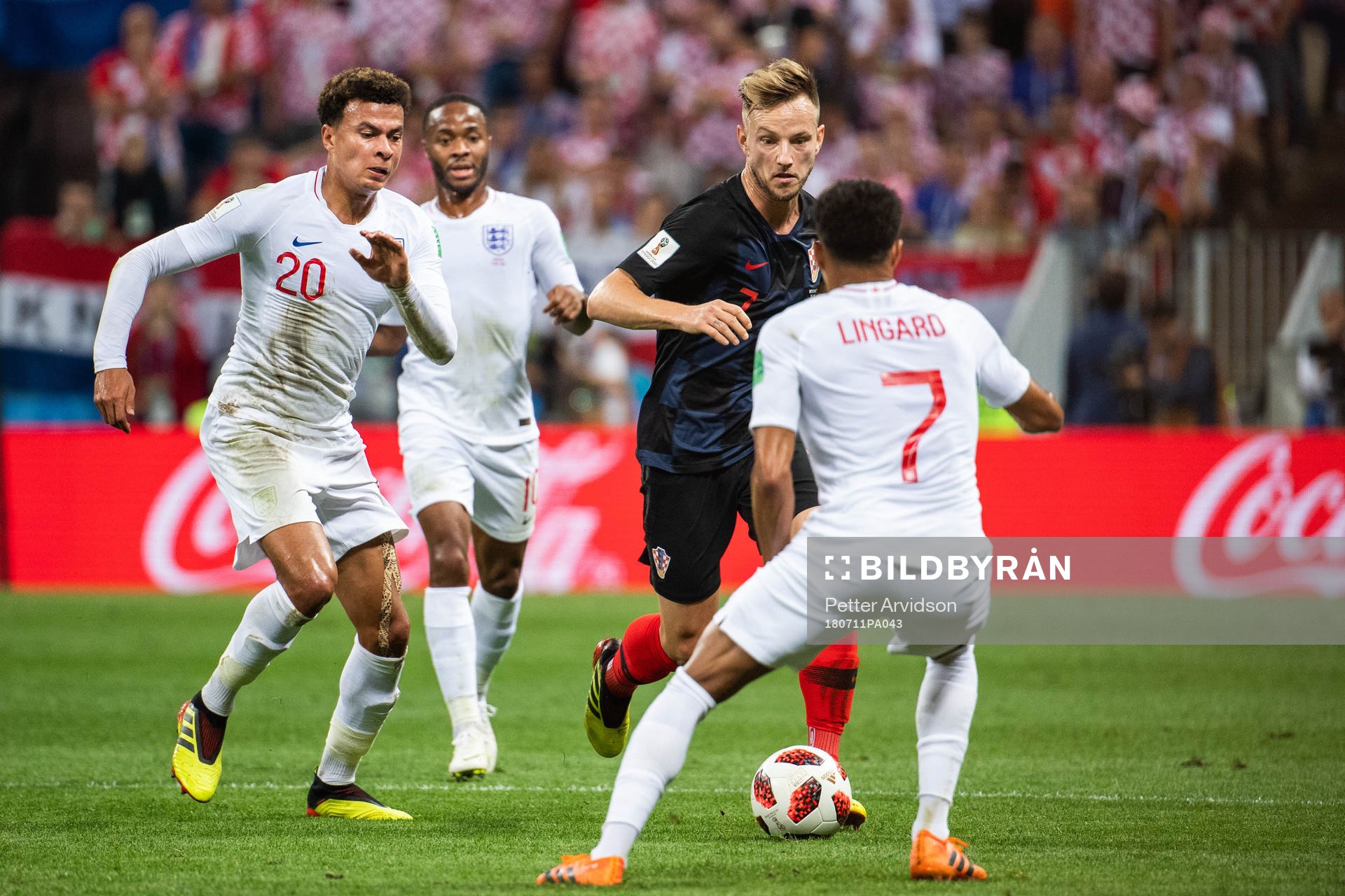 Dele Alli of England and Ivan Rakitic of Croatia